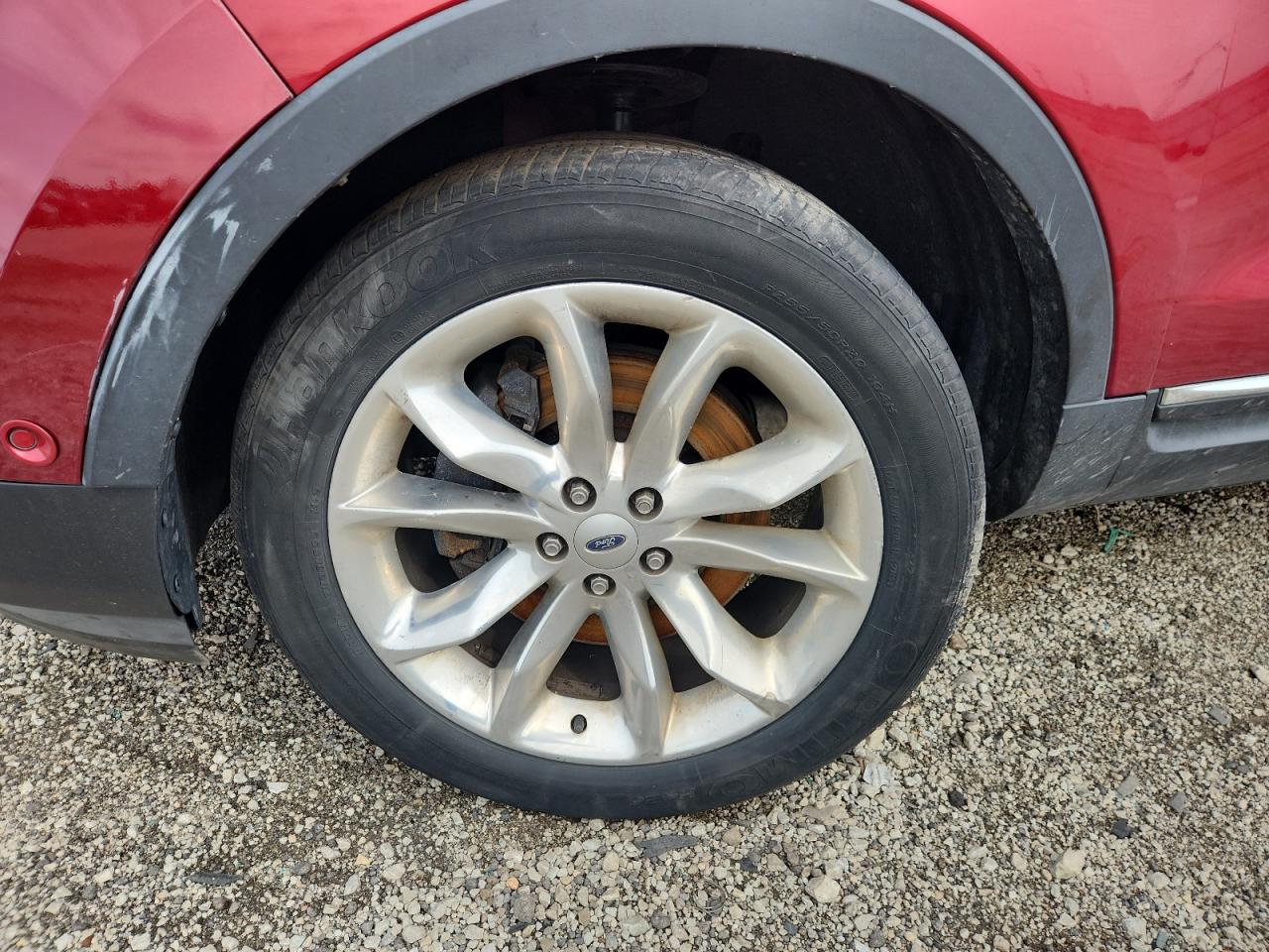 2015 Ford Explorer Limited Red vin: 1FM5K8F83FGA40452 Damage: Lf Fender Cladding, Heavy Scratch, 9 To 10 Inches