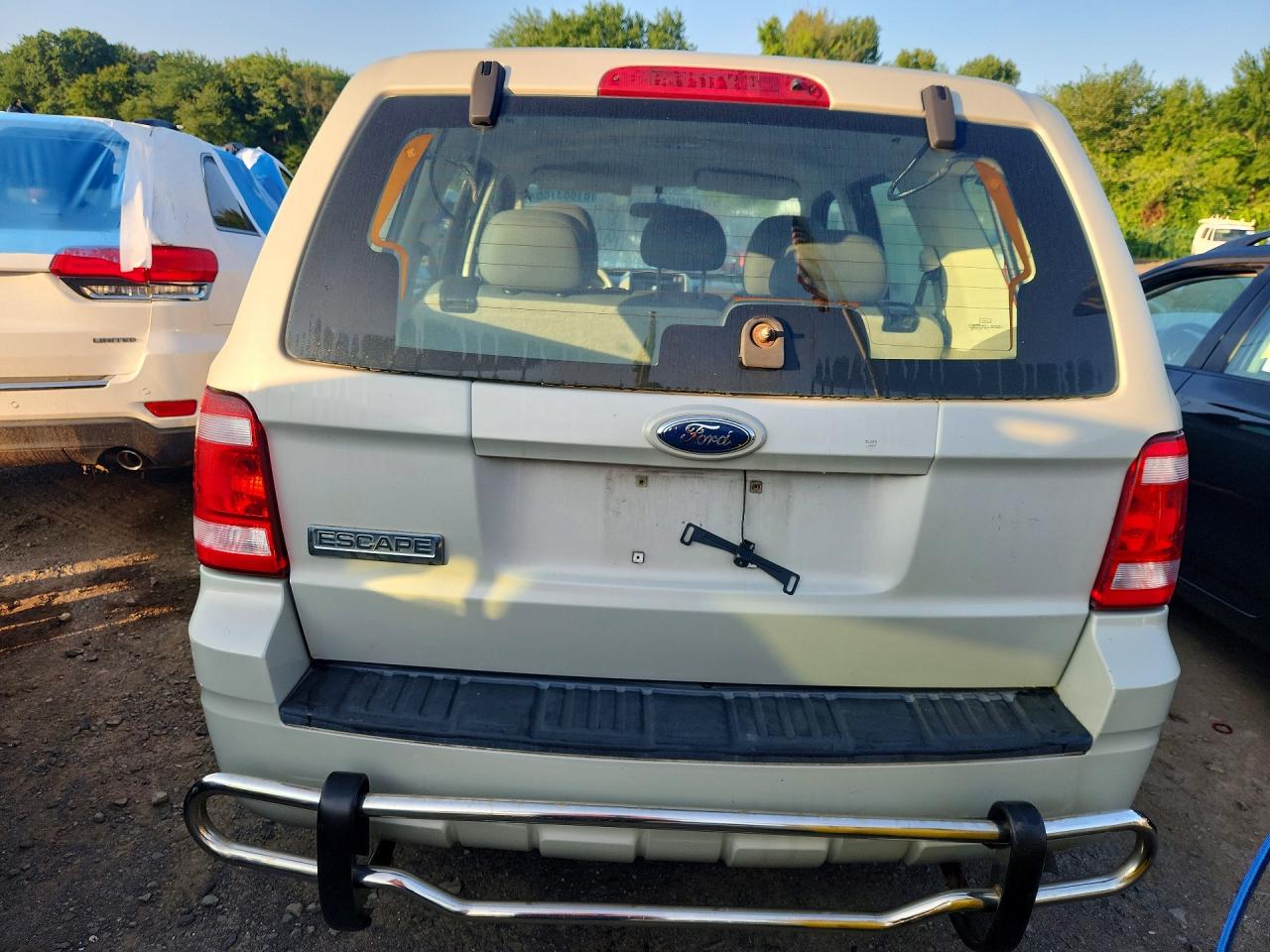 2009 Ford Escape Xls Tan vin: 1FMCU02779KC67094