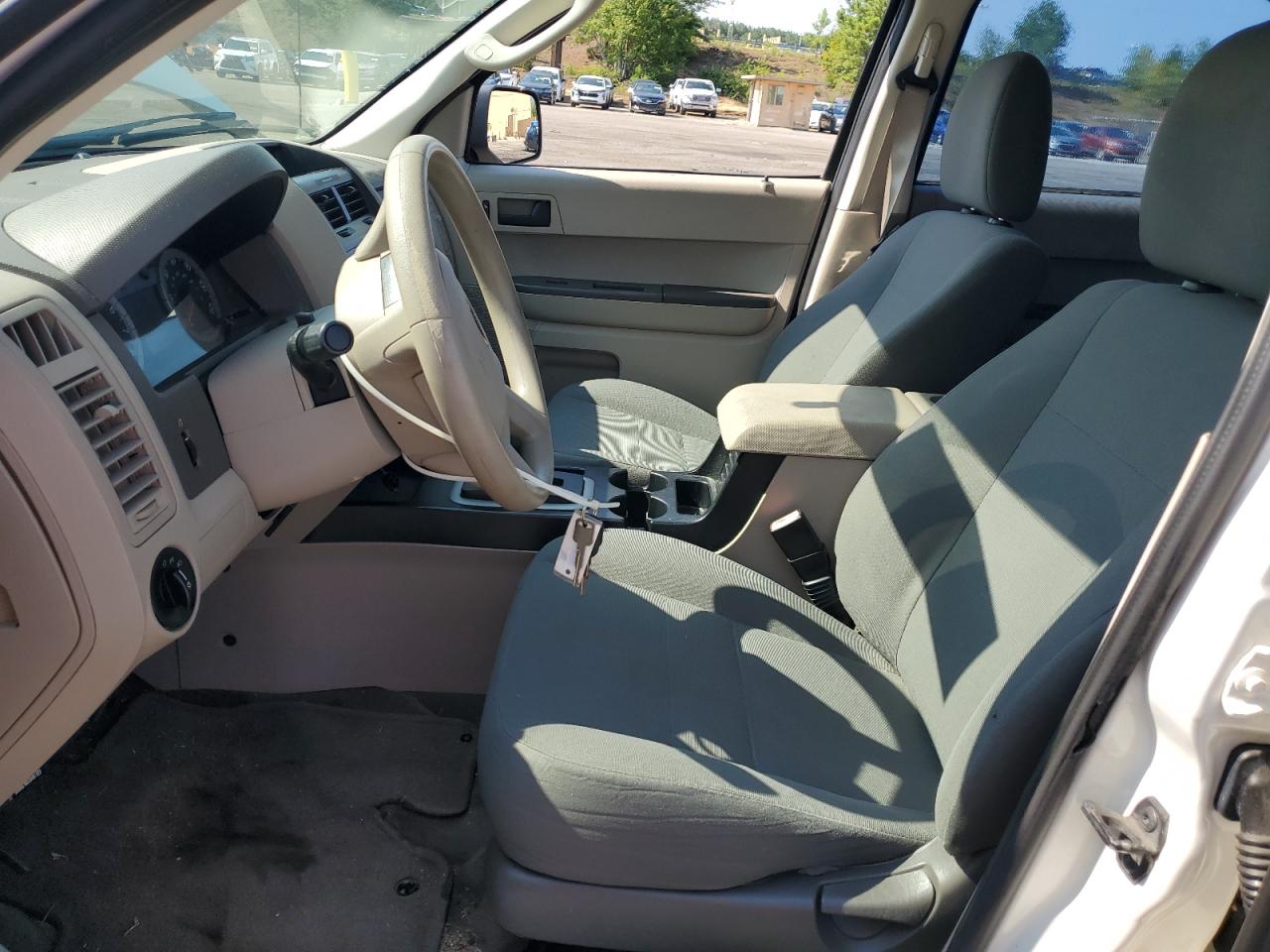 2009 Ford Escape Xls White vin: 1FMCU027X9KA74907 Damage: Left Front Carpet, Stained, Permanent