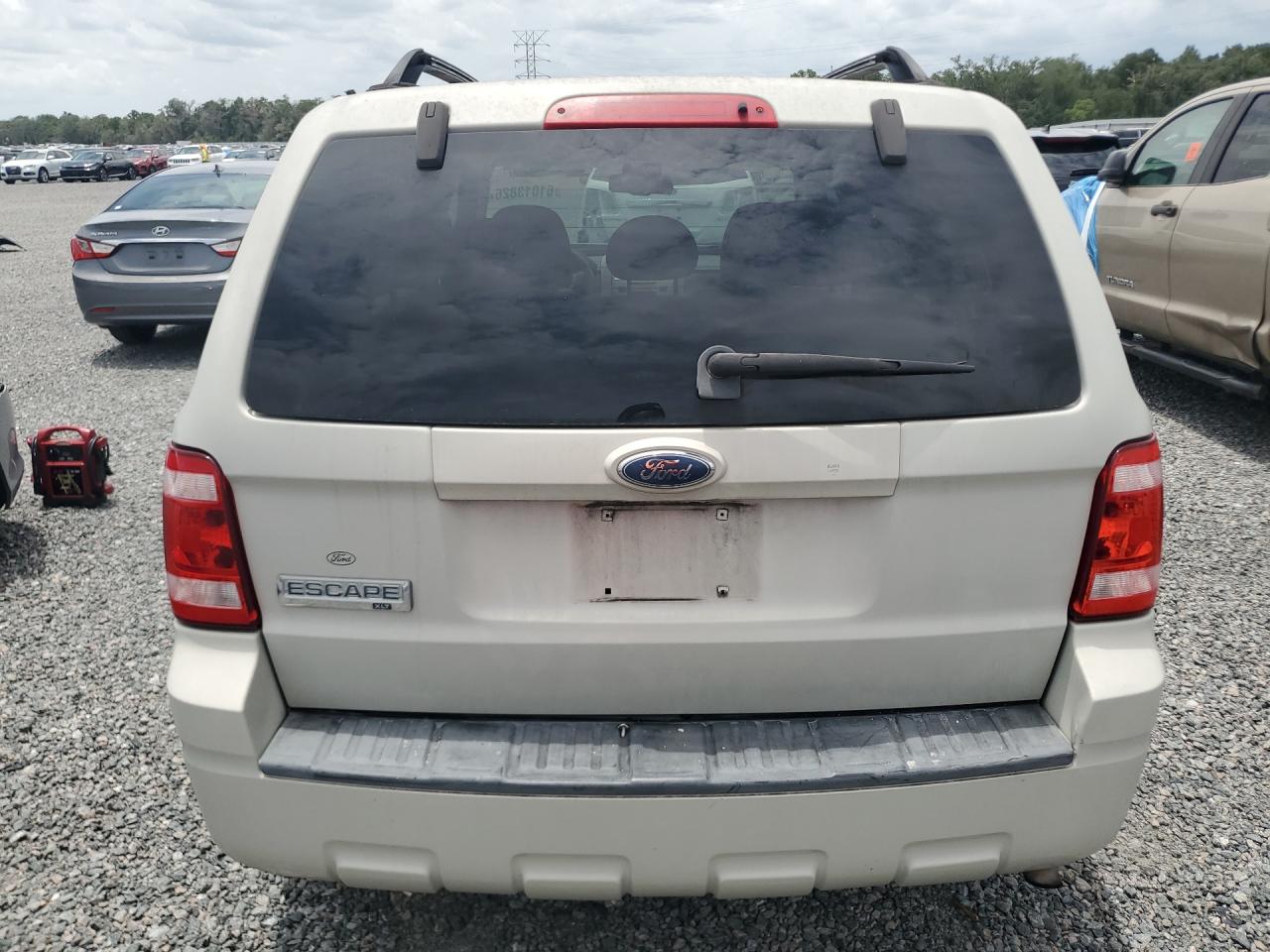 2009 Ford Escape Xlt Gold vin: 1FMCU03G99KA29245
