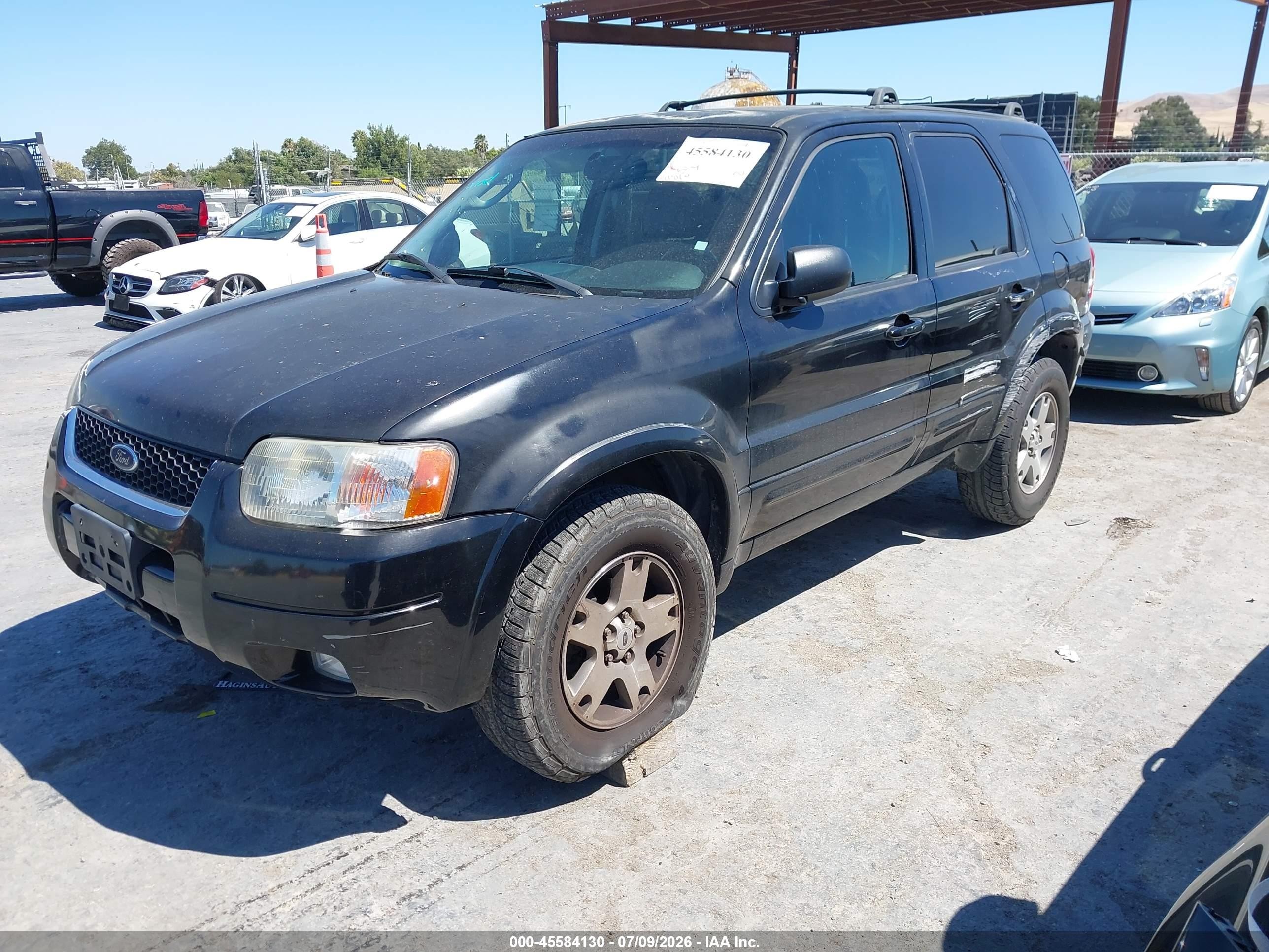 2003 Ford Escape Limited Черный vin: 1FMCU04163KE11119
