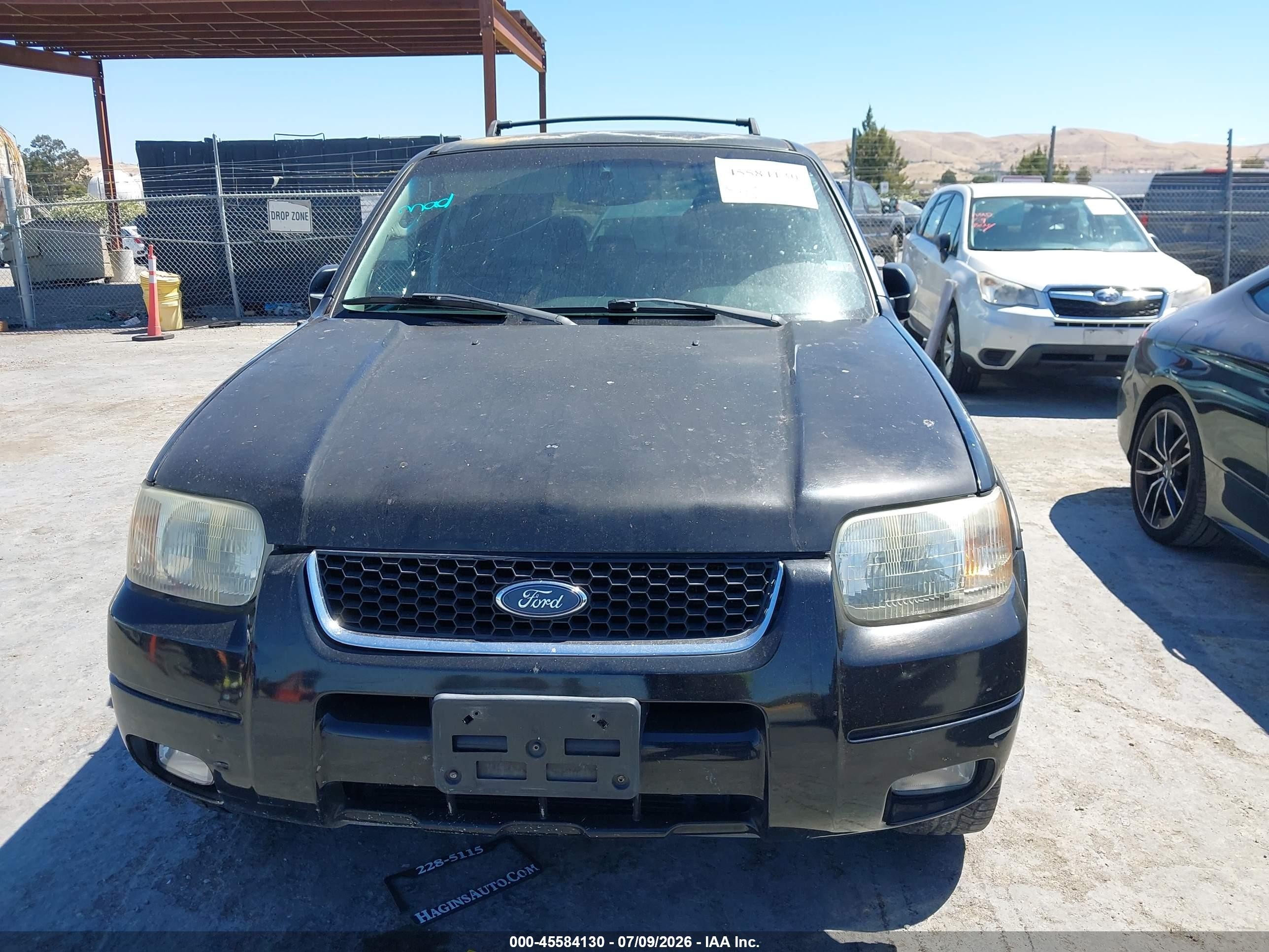 2003 Ford Escape Limited Черный vin: 1FMCU04163KE11119