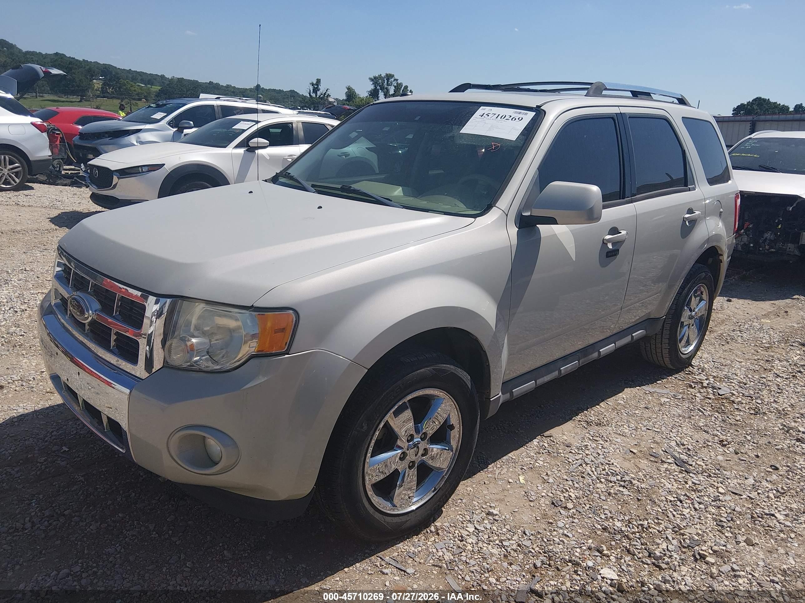 2009 Ford Escape Limited Tan vin: 1FMCU04779KC25764
