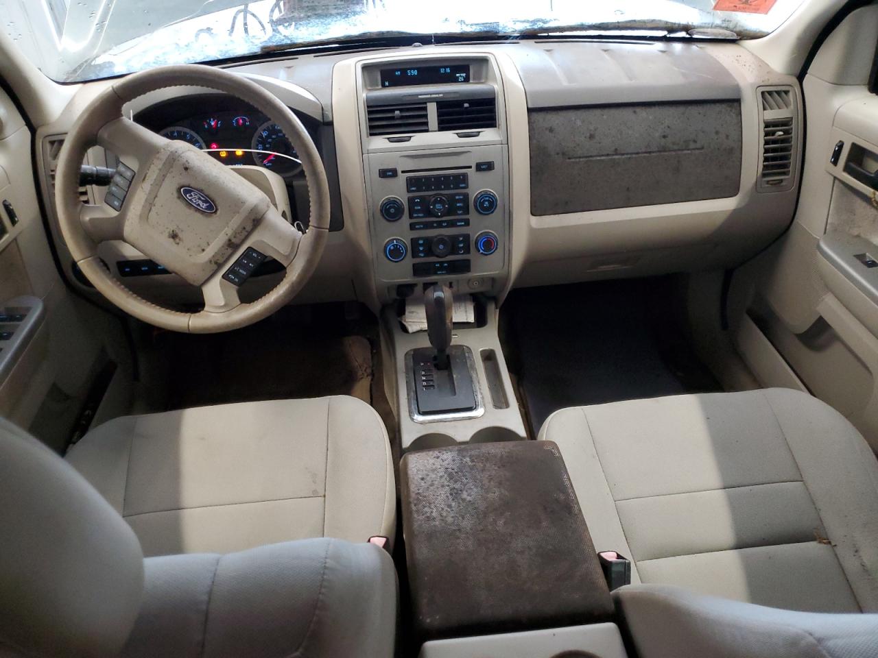 2010 Ford Escape Xlt Blue vin: 1FMCU0D72AKC94138 Damage: Console Cover, Stained, Permanent