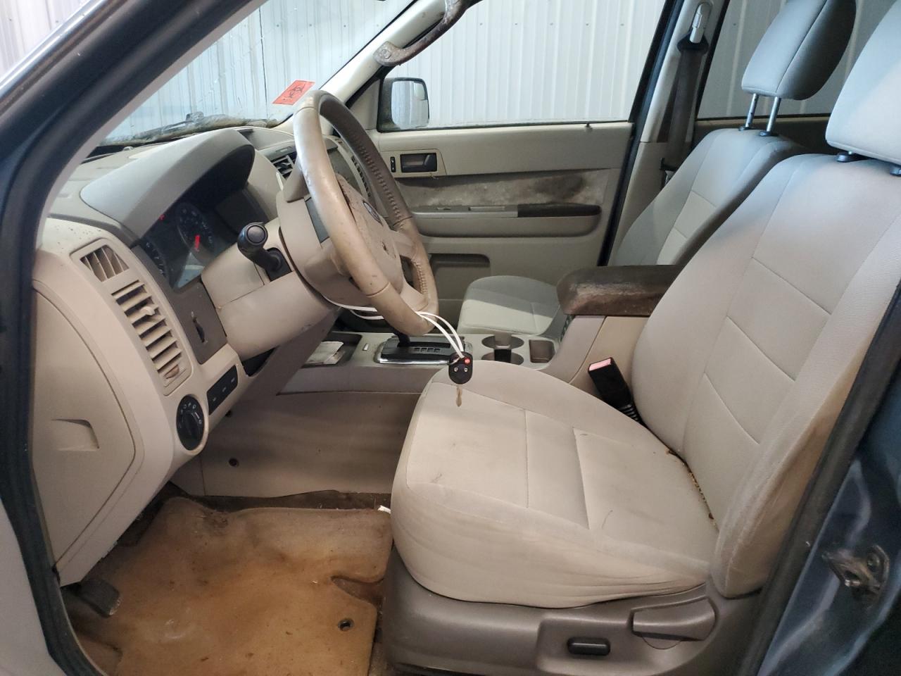 2010 Ford Escape Xlt Blue vin: 1FMCU0D72AKC94138 Damage: Left Front Seat, Stained, Permanent