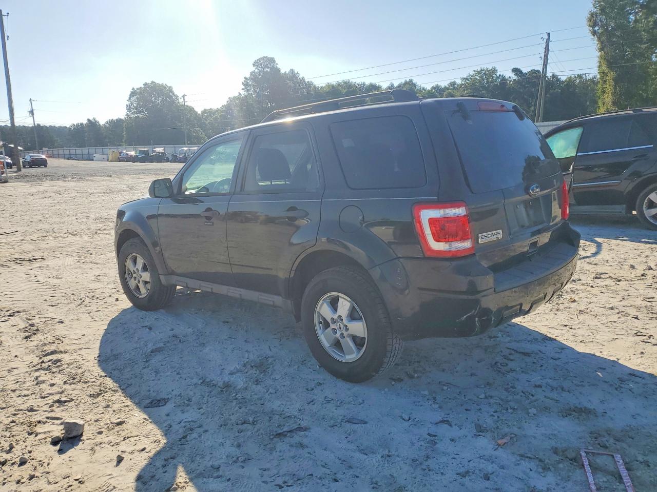 2010 Ford Escape Xlt Black vin: 1FMCU0D76AKA93567