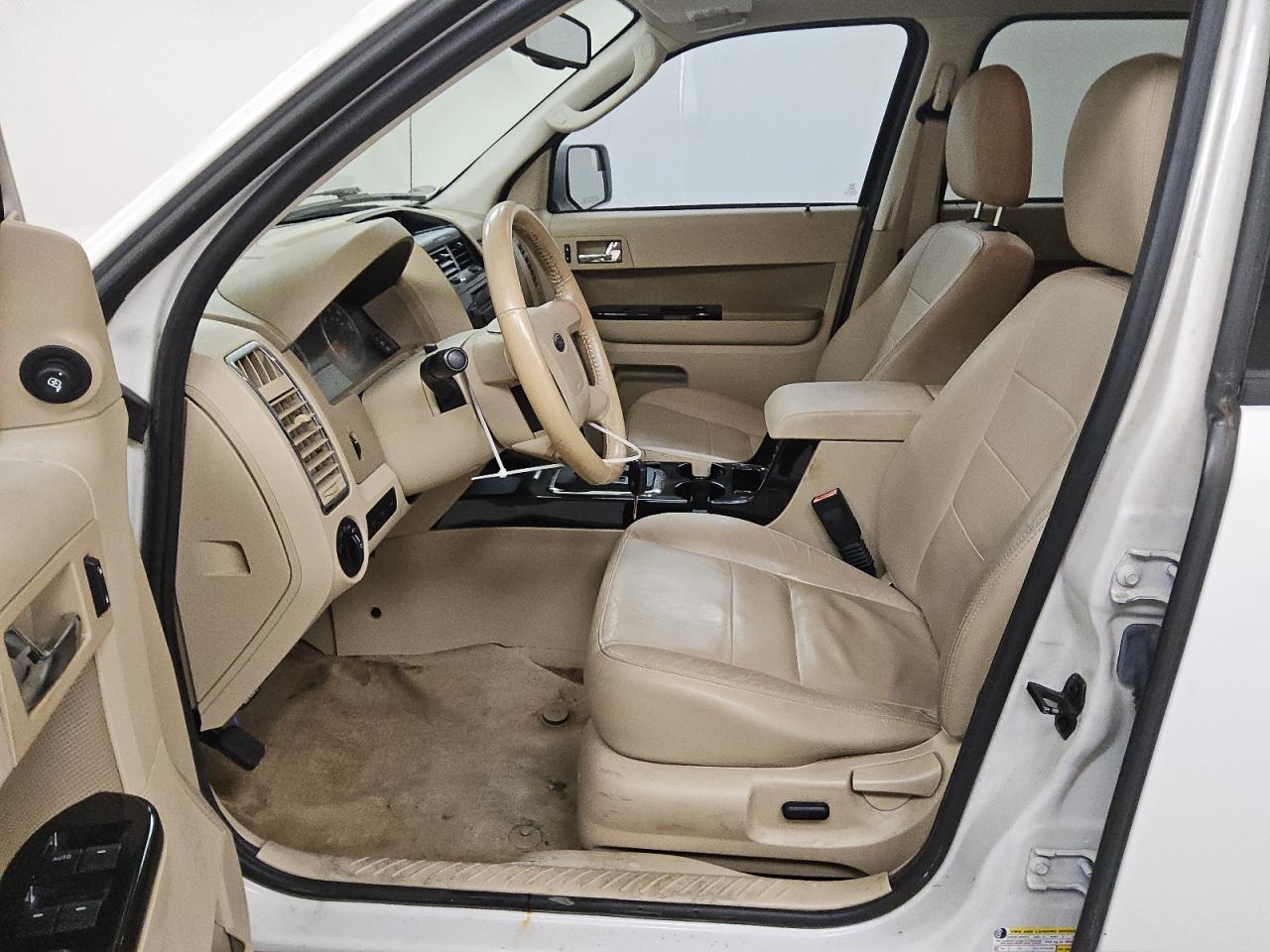 2012 Ford Escape Limited White vin: 1FMCU0E72CKC47953 Damage: Left Front Carpet, Stained, Permanent