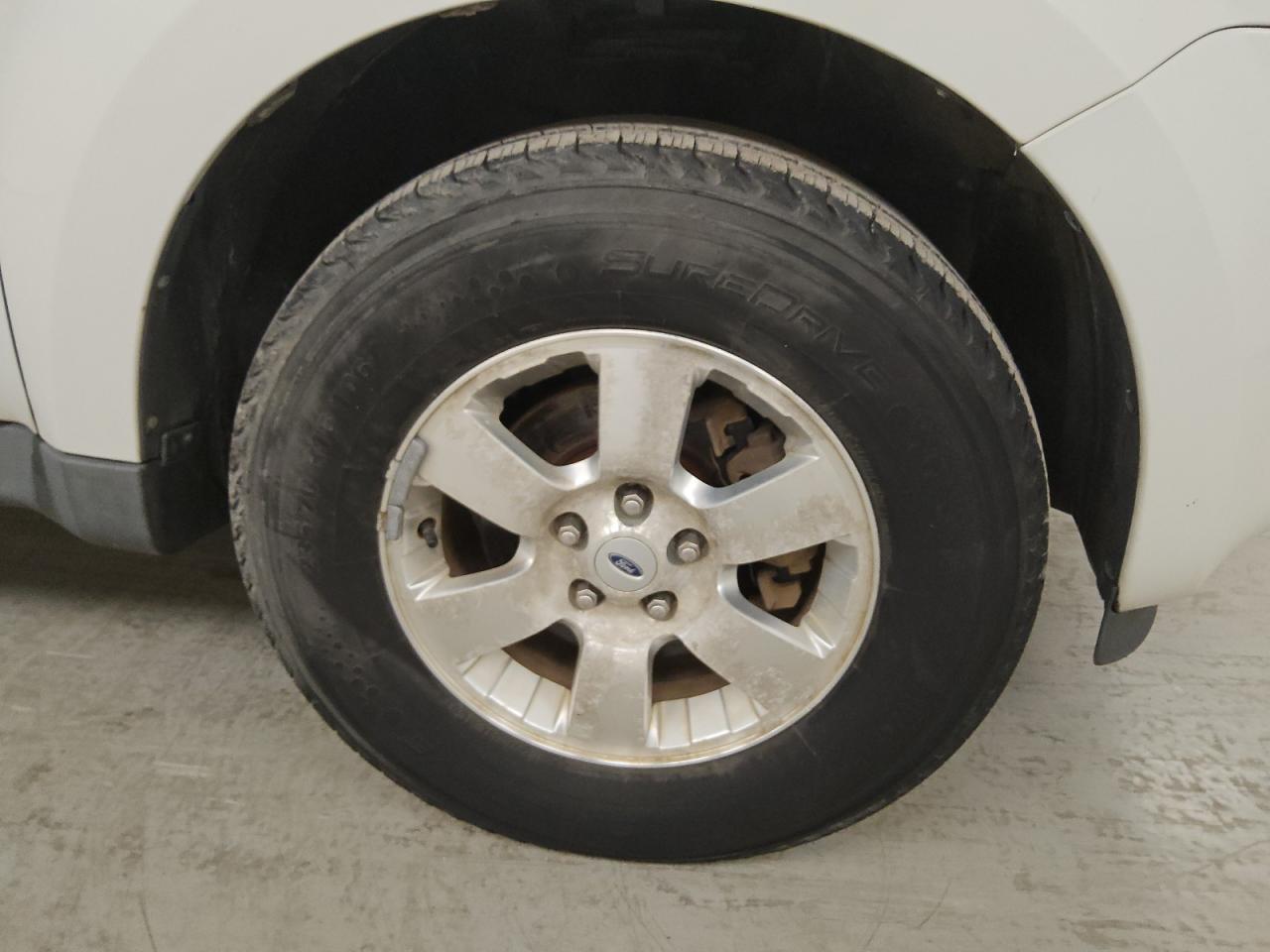 2012 Ford Escape Limited White vin: 1FMCU0E72CKC47953 Damage: Right Front Wheel, Corrosion, > 12 Inches