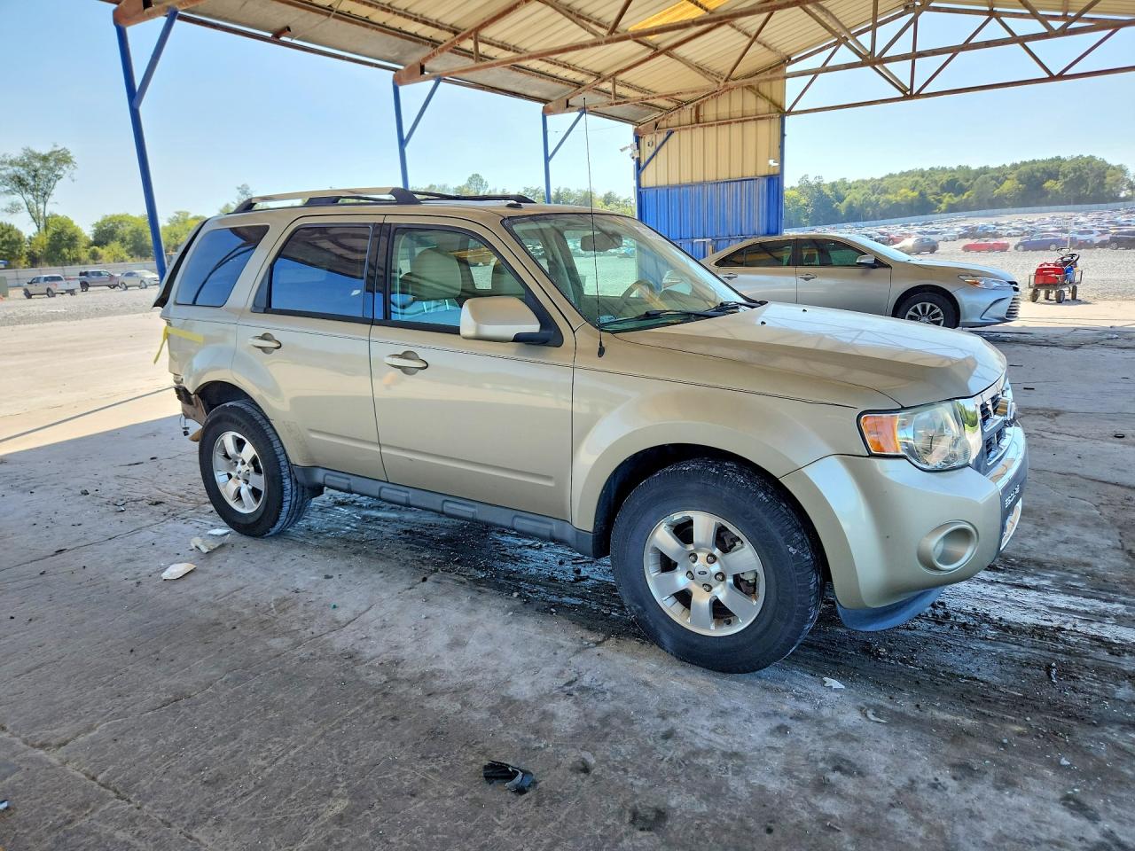 2012 Ford Escape Limited Gold vin: 1FMCU0E77CKC63940