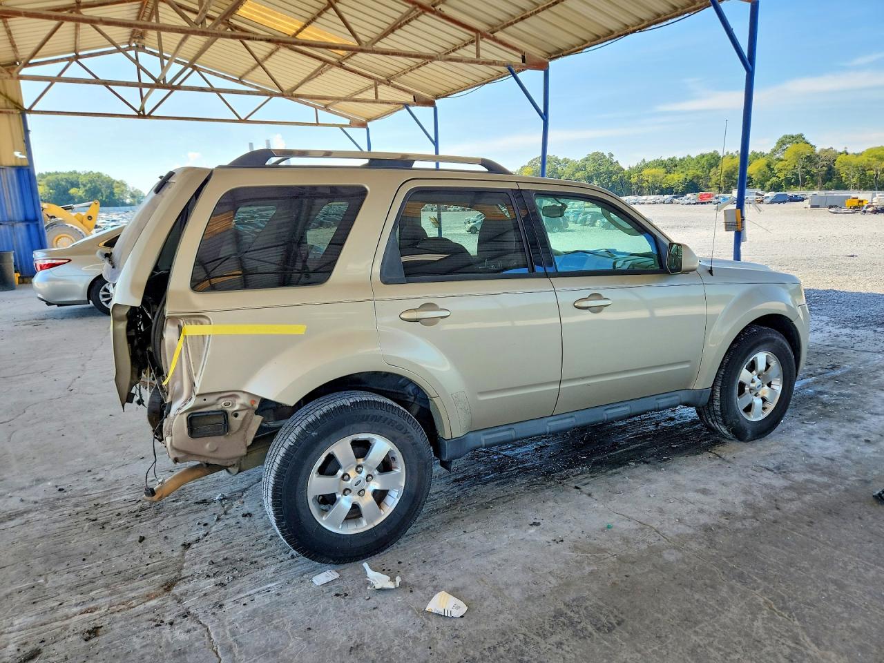 2012 Ford Escape Limited Gold vin: 1FMCU0E77CKC63940