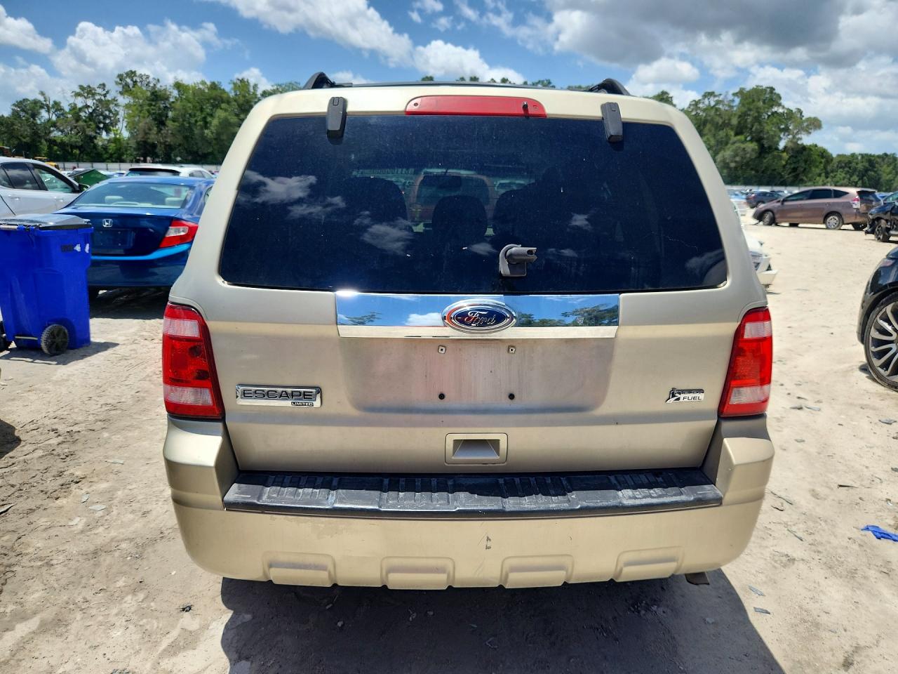 2010 Ford Escape Limited Золотой vin: 1FMCU0EGXAKB91421