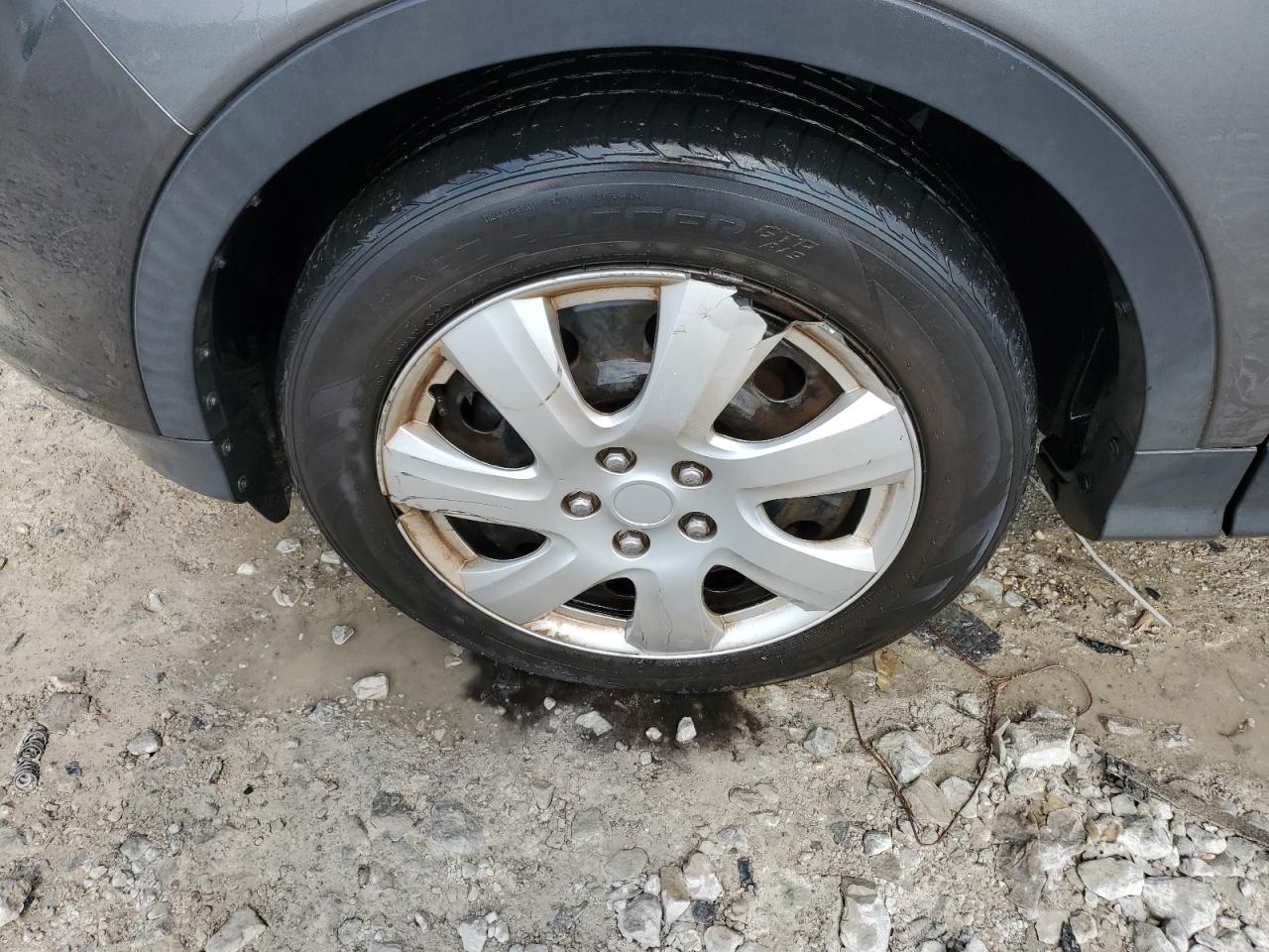 2015 Ford Escape S Gray vin: 1FMCU0F70FUC32116 Damage: Left Front Wheel Cover, Broken, Replacement Required