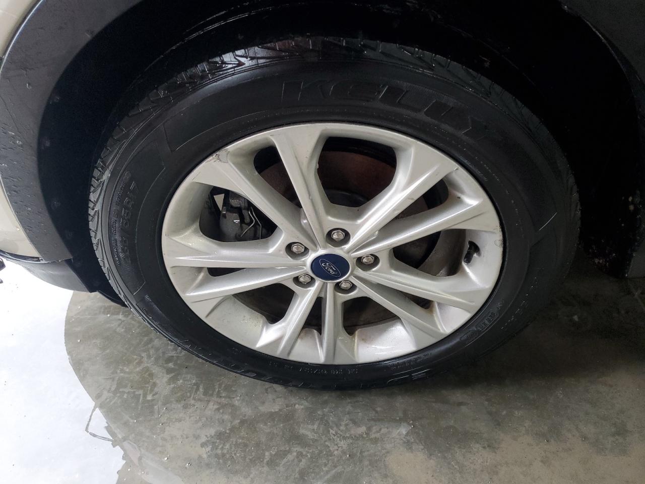 2018 Ford Escape S Gold vin: 1FMCU0F73JUB04719 Damage: Left Front Wheel, Curb Rash, 1 To 2 Inches