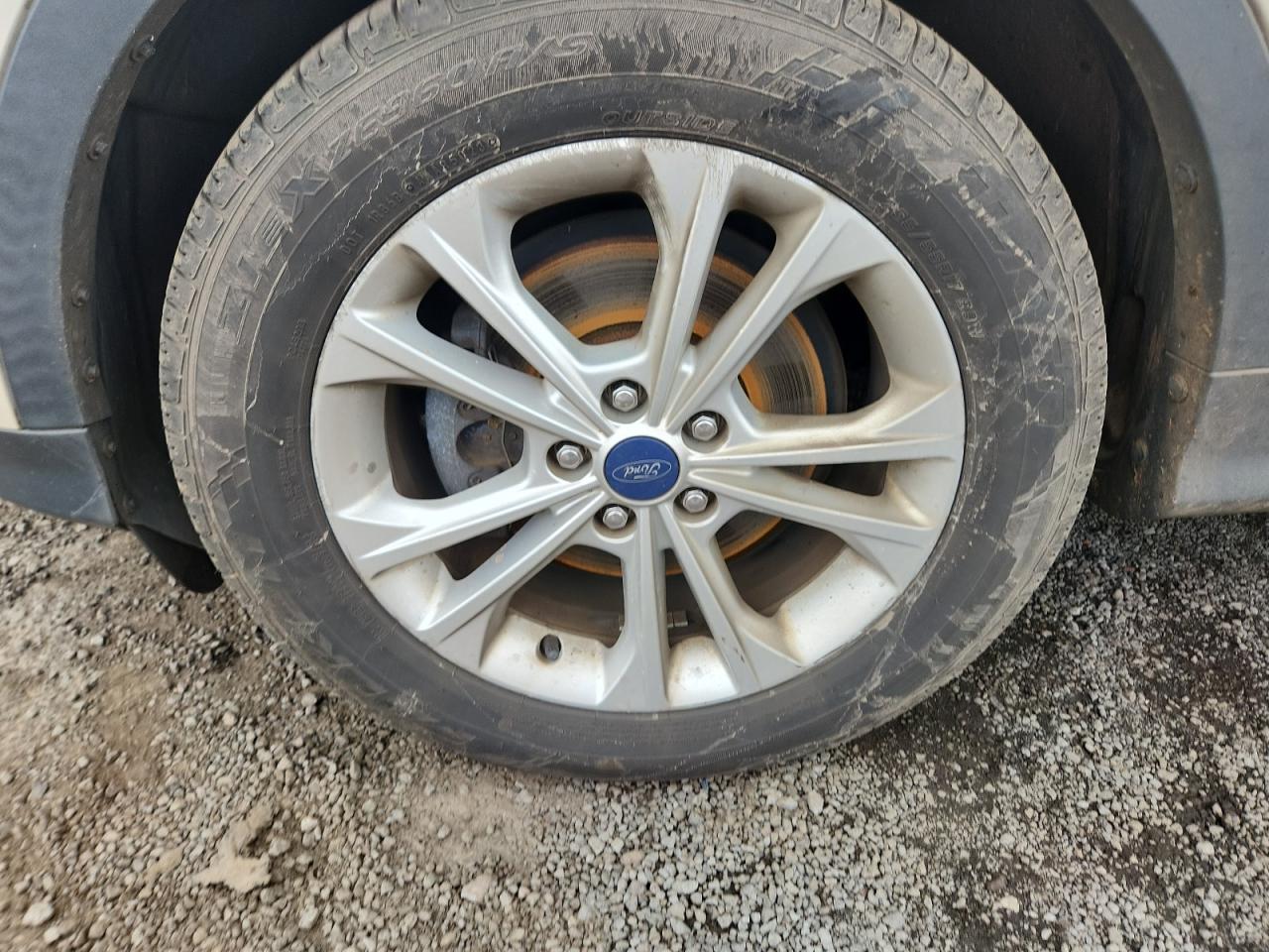 2018 Ford Escape S Gold vin: 1FMCU0F74JUB14644 Damage: Left Front Wheel, Curb Rash, > 12 Inches