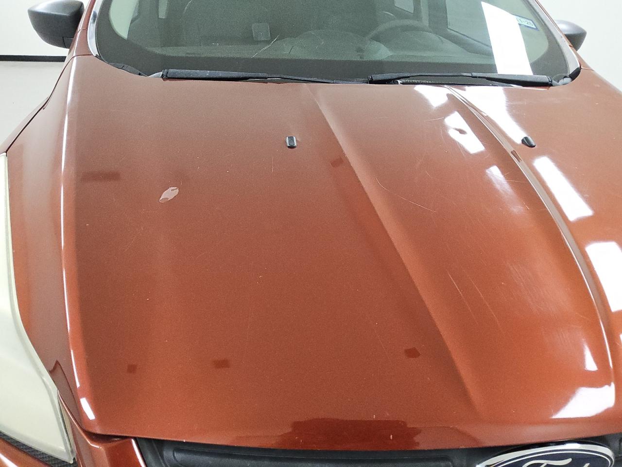 2014 Ford Escape S Orange vin: 1FMCU0F77EUD58021 Damage: Hood, Heavy Scratch, 1 To 2 Inches
