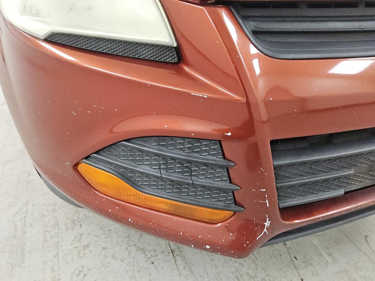 2014 Ford Escape S Orange vin: 1FMCU0F77EUD58021 Damage: Front Bumper, Heavy Scratch, 4 To 5 Inches