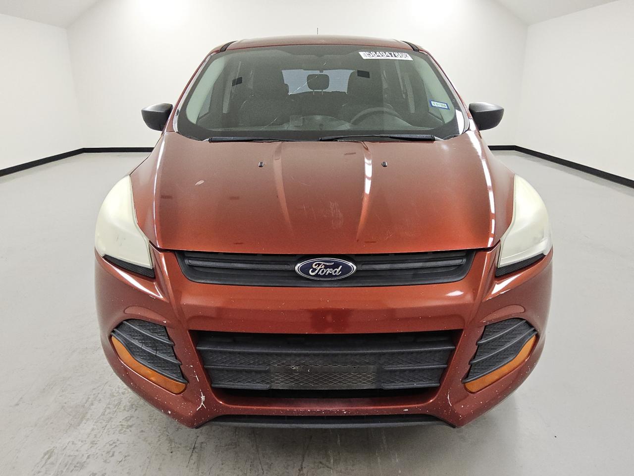 2014 Ford Escape S Orange vin: 1FMCU0F77EUD58021 Damage: Oil, Low Fluid, Unacceptable