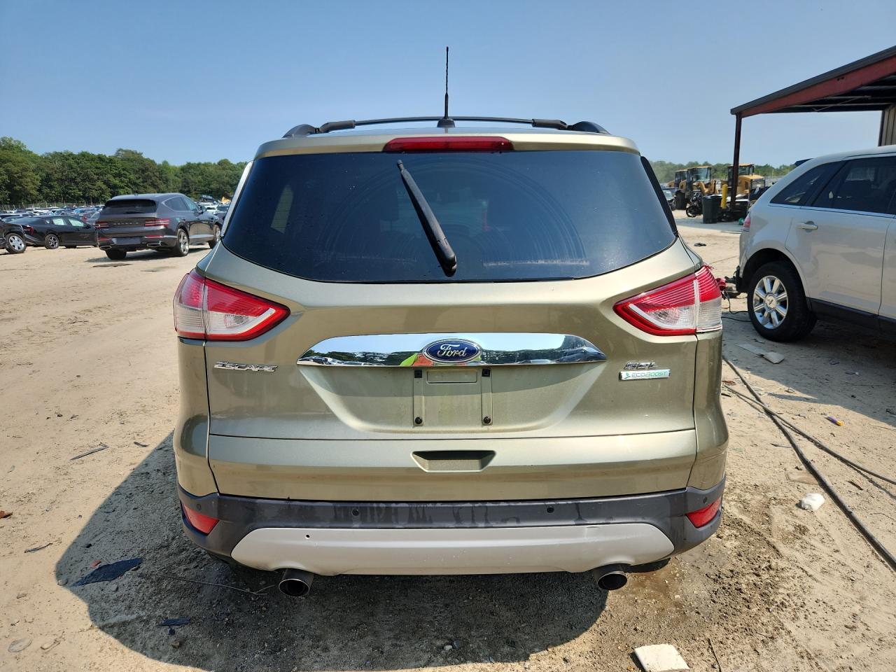 2013 Ford Escape Sel Green vin: 1FMCU0H93DUD31895 Damage: Lift Gate Trim Panel, Heavy Scratch, 1/8 To 1/2 Inch