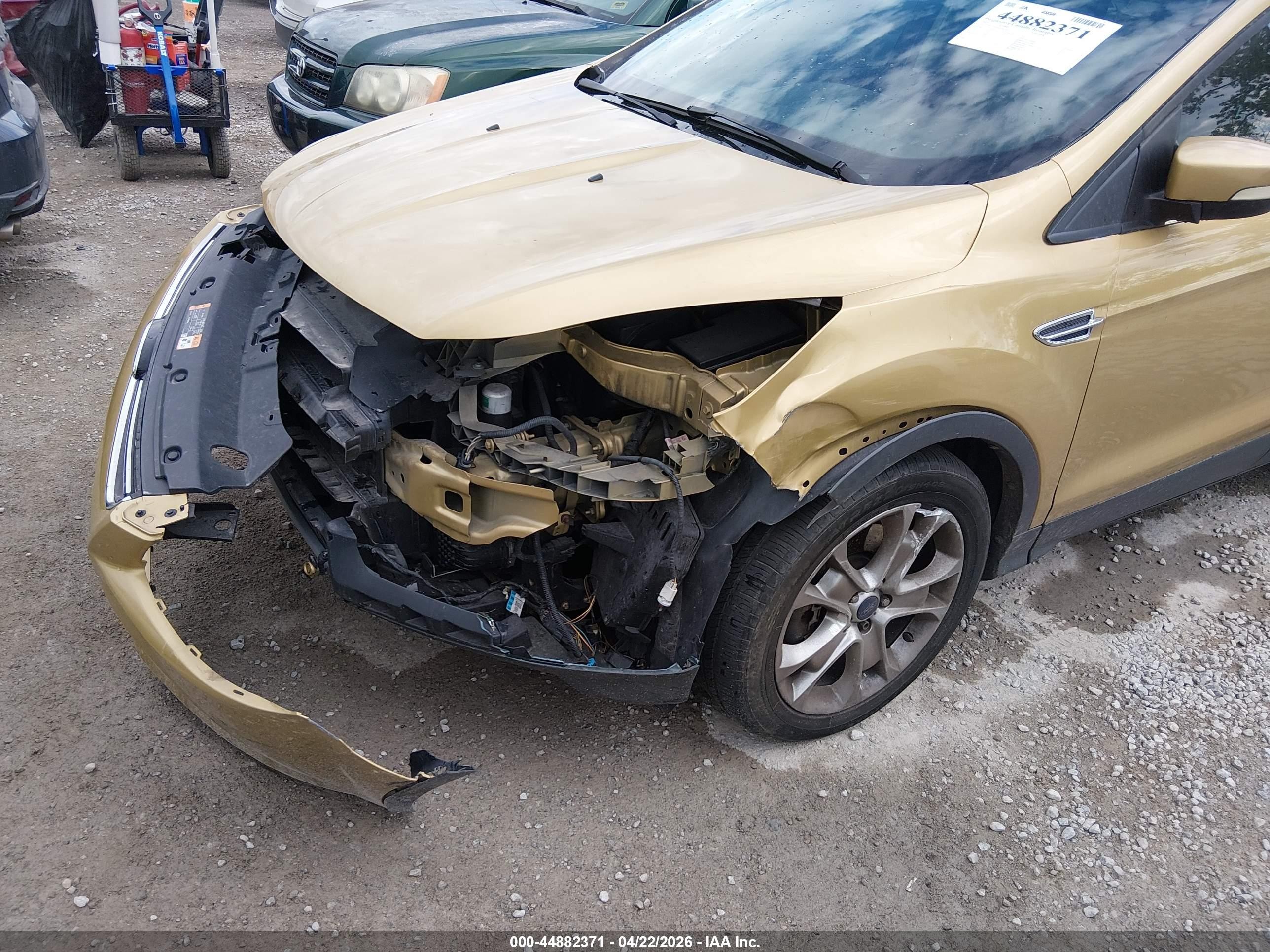 2014 Ford Escape Titanium Gold vin: 1FMCU0J92EUD63443