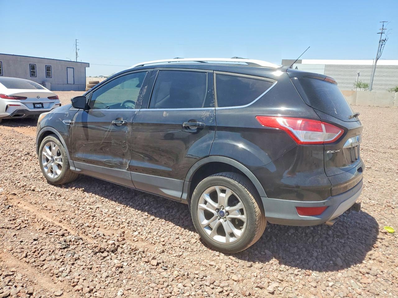 2016 Ford Escape Titanium Black vin: 1FMCU0J93GUC60065