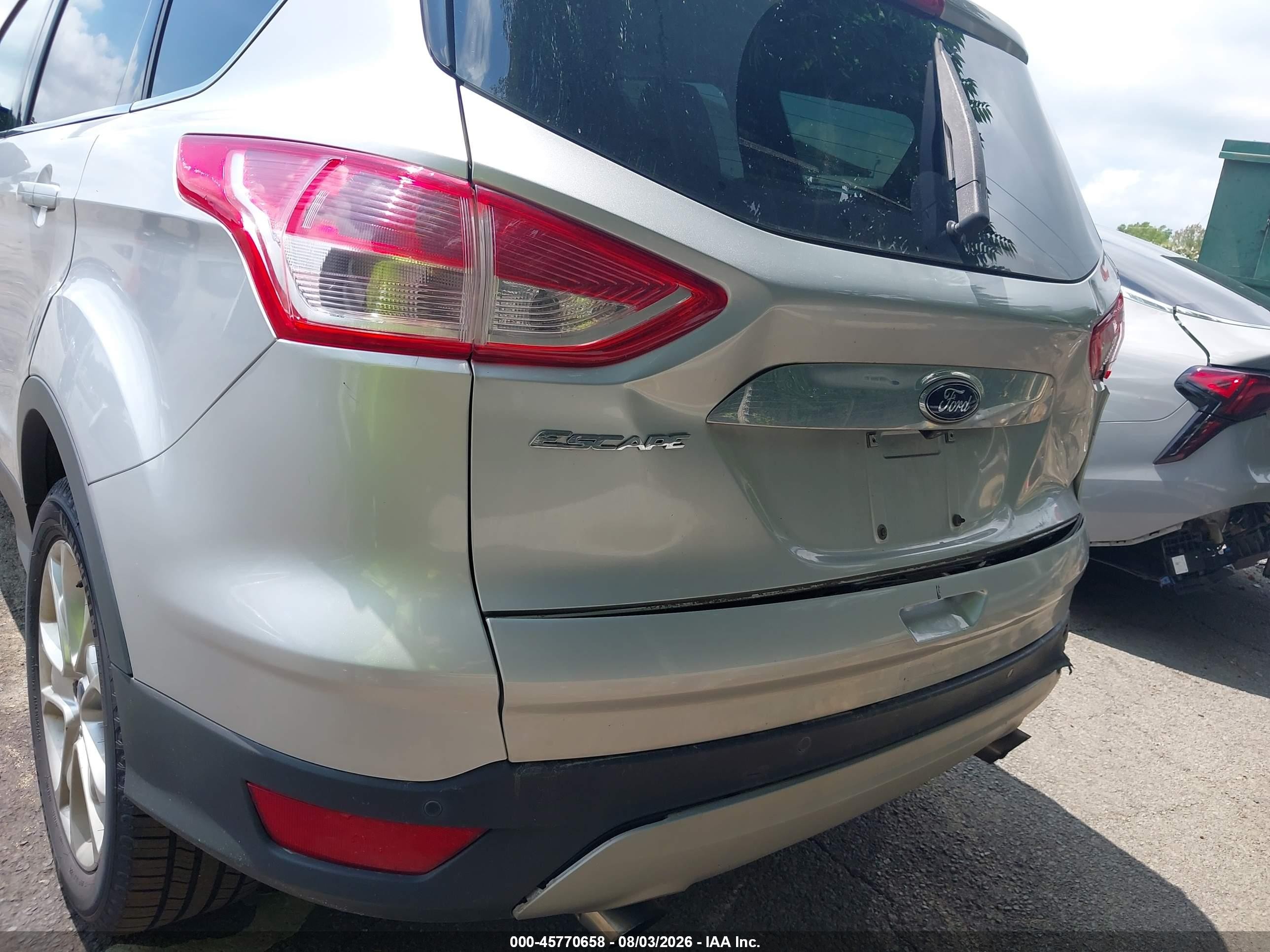 2014 Ford Escape Titanium Серебряный vin: 1FMCU0J94EUB08454