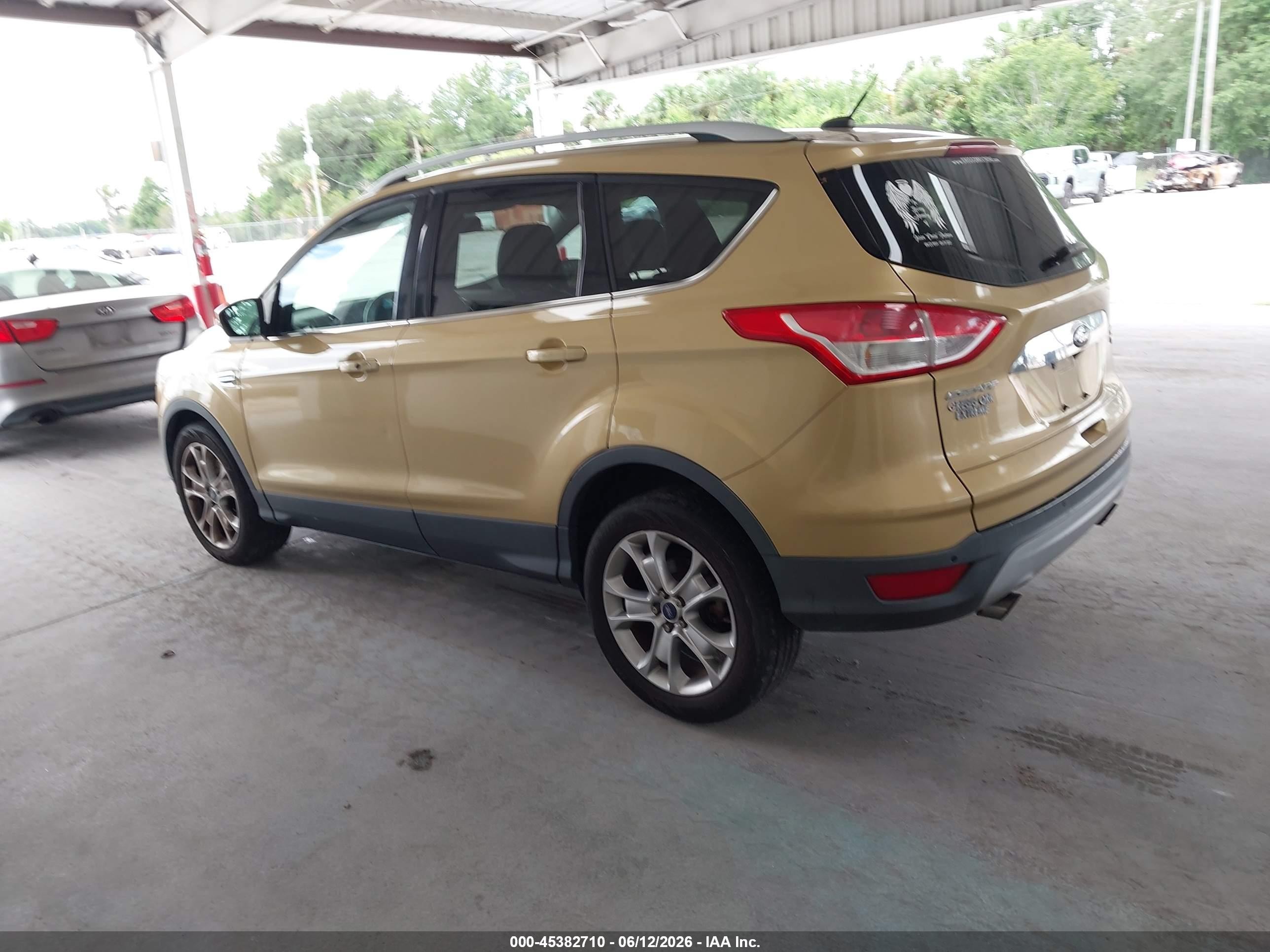 2015 Ford Escape Titanium Gold vin: 1FMCU0J95FUA26928
