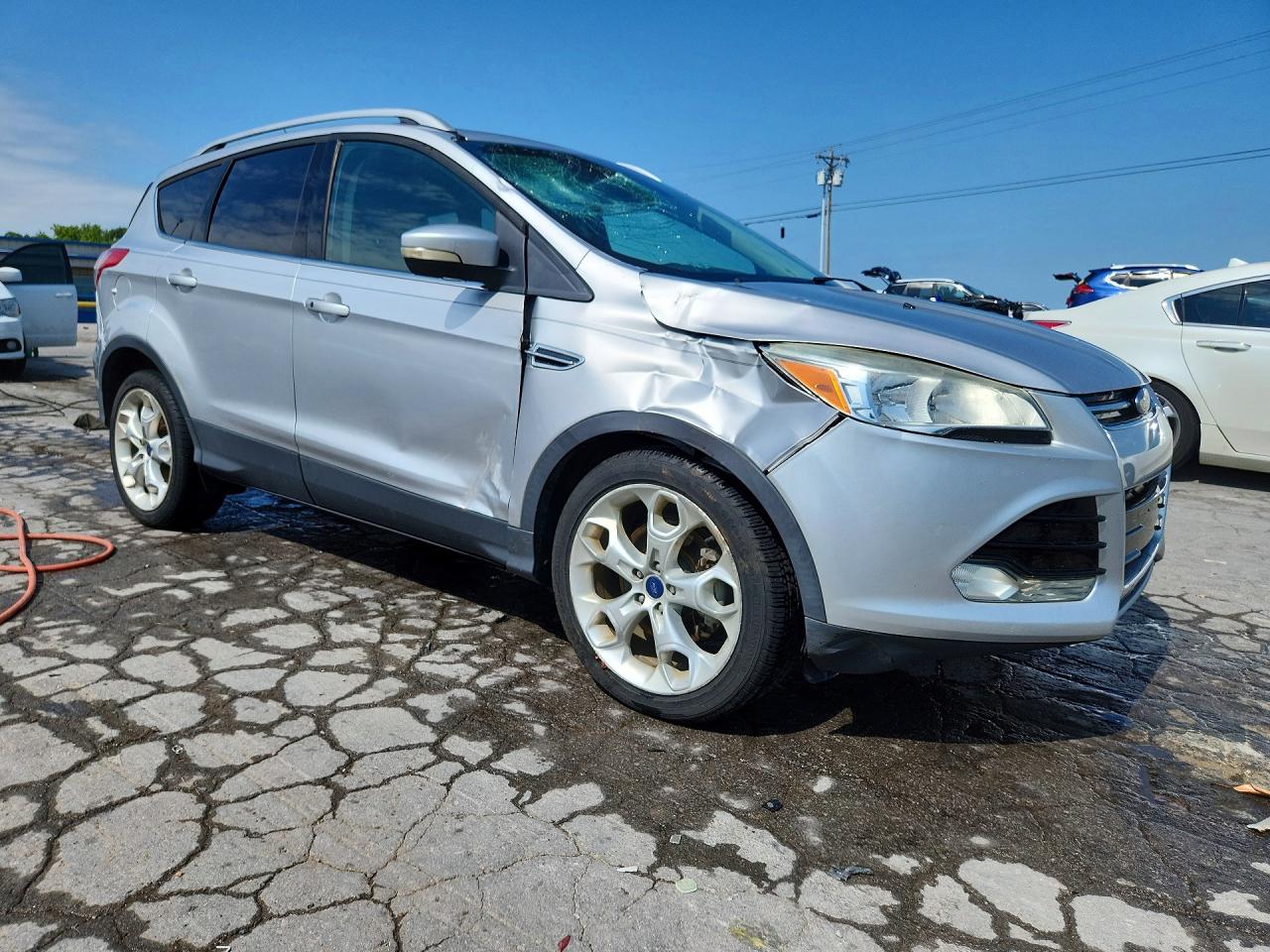 2014 Ford Escape Titanium Серебряный vin: 1FMCU0J97EUE20476