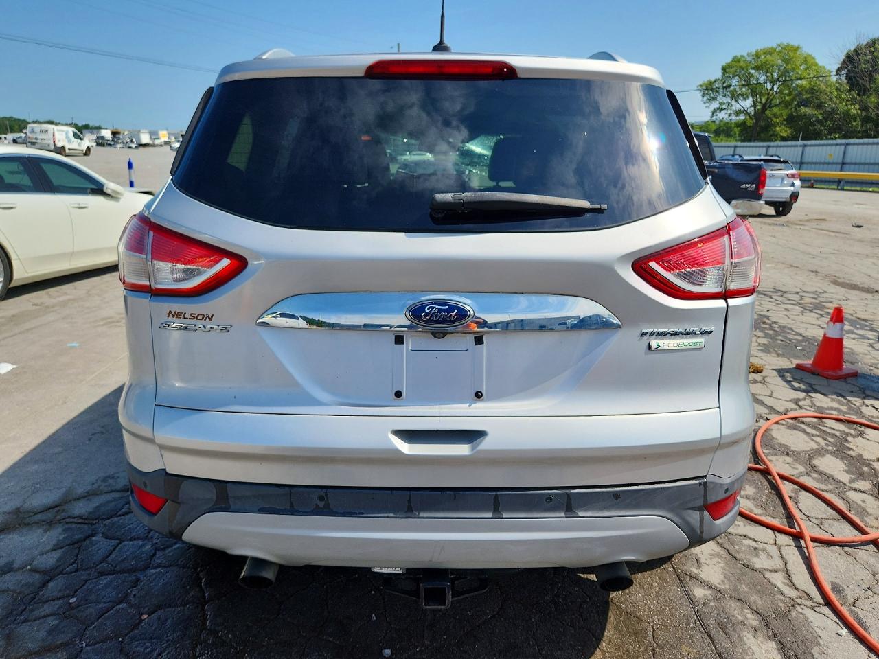 2014 Ford Escape Titanium Серебряный vin: 1FMCU0J97EUE20476