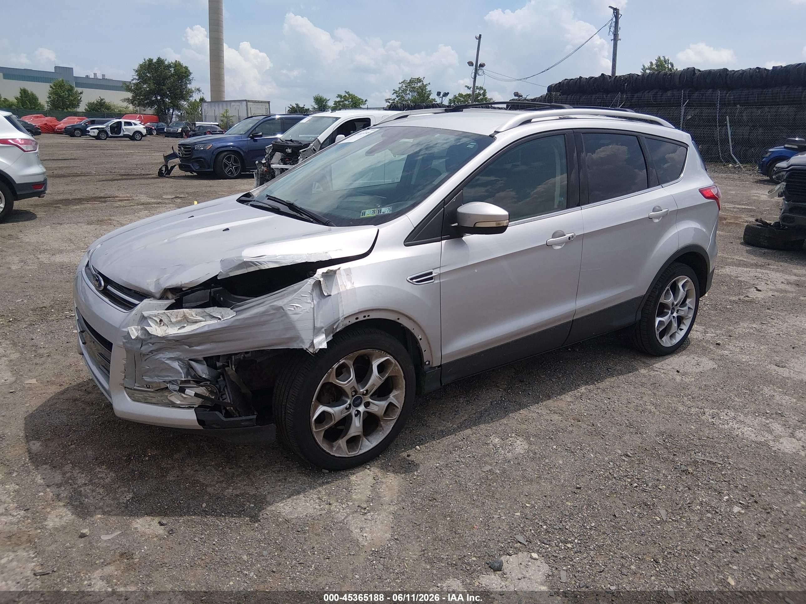 2015 Ford Escape Titanium Серебряный vin: 1FMCU0J97FUA61700