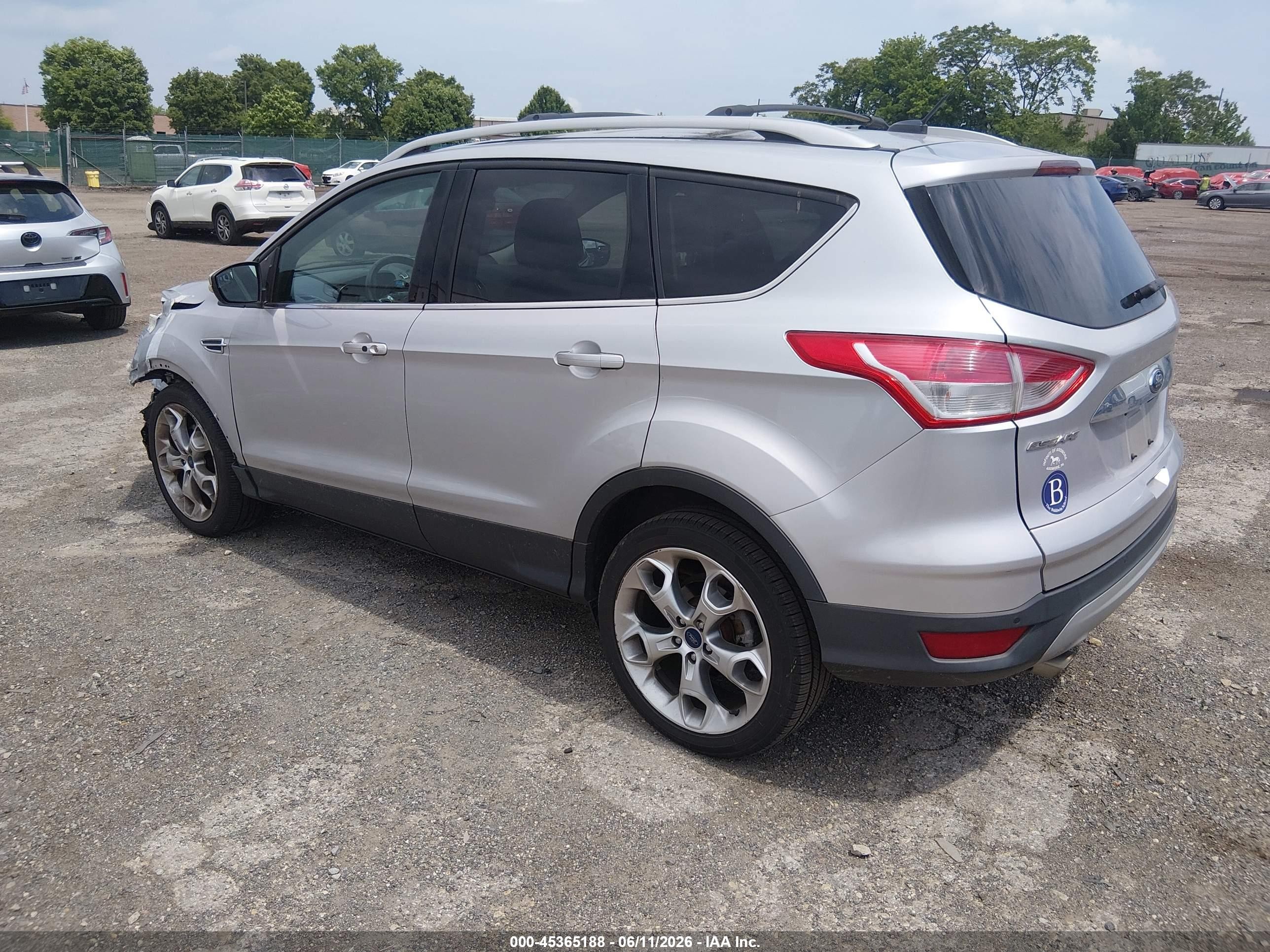 2015 Ford Escape Titanium Серебряный vin: 1FMCU0J97FUA61700