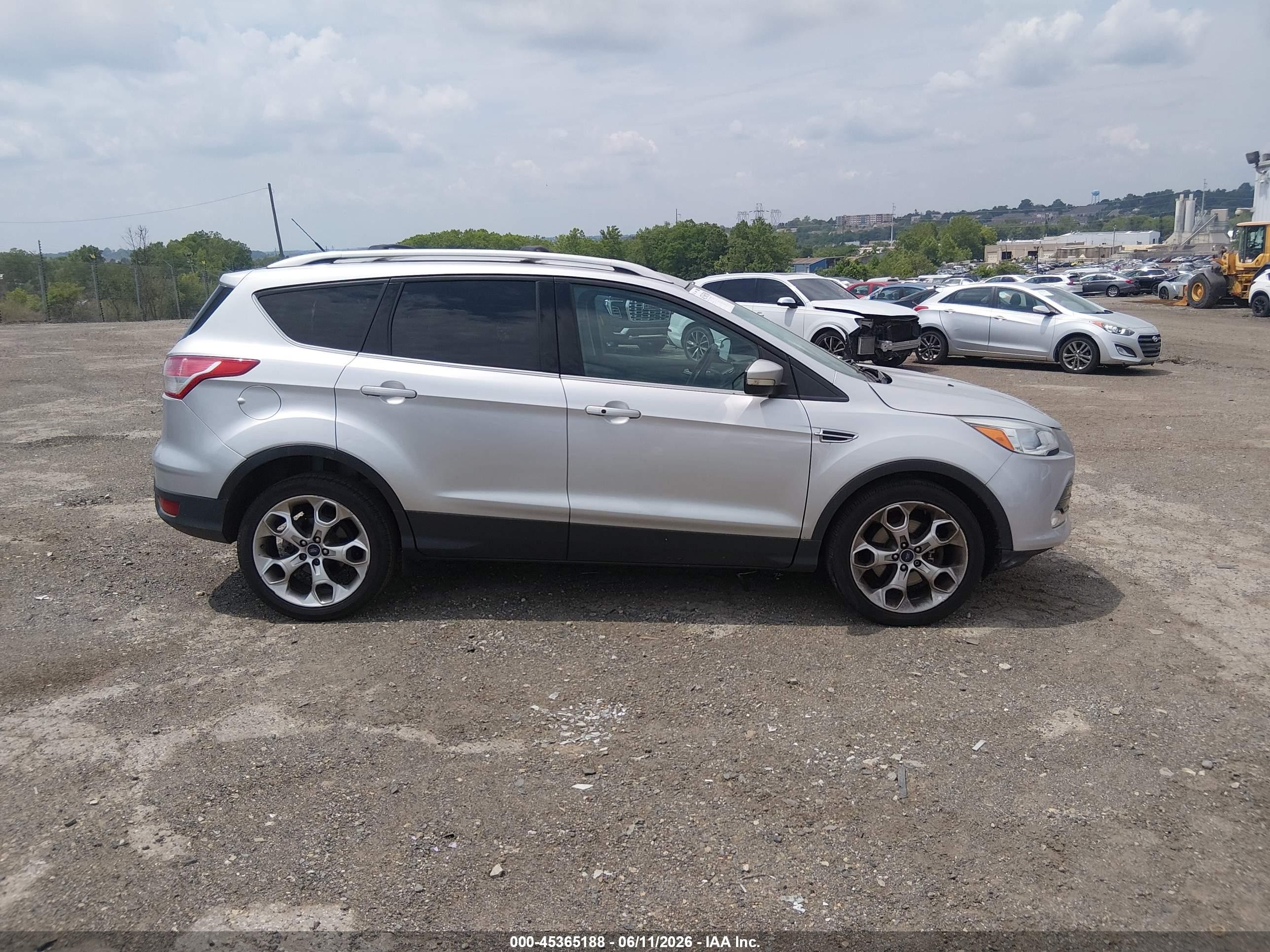 2015 Ford Escape Titanium Серебряный vin: 1FMCU0J97FUA61700