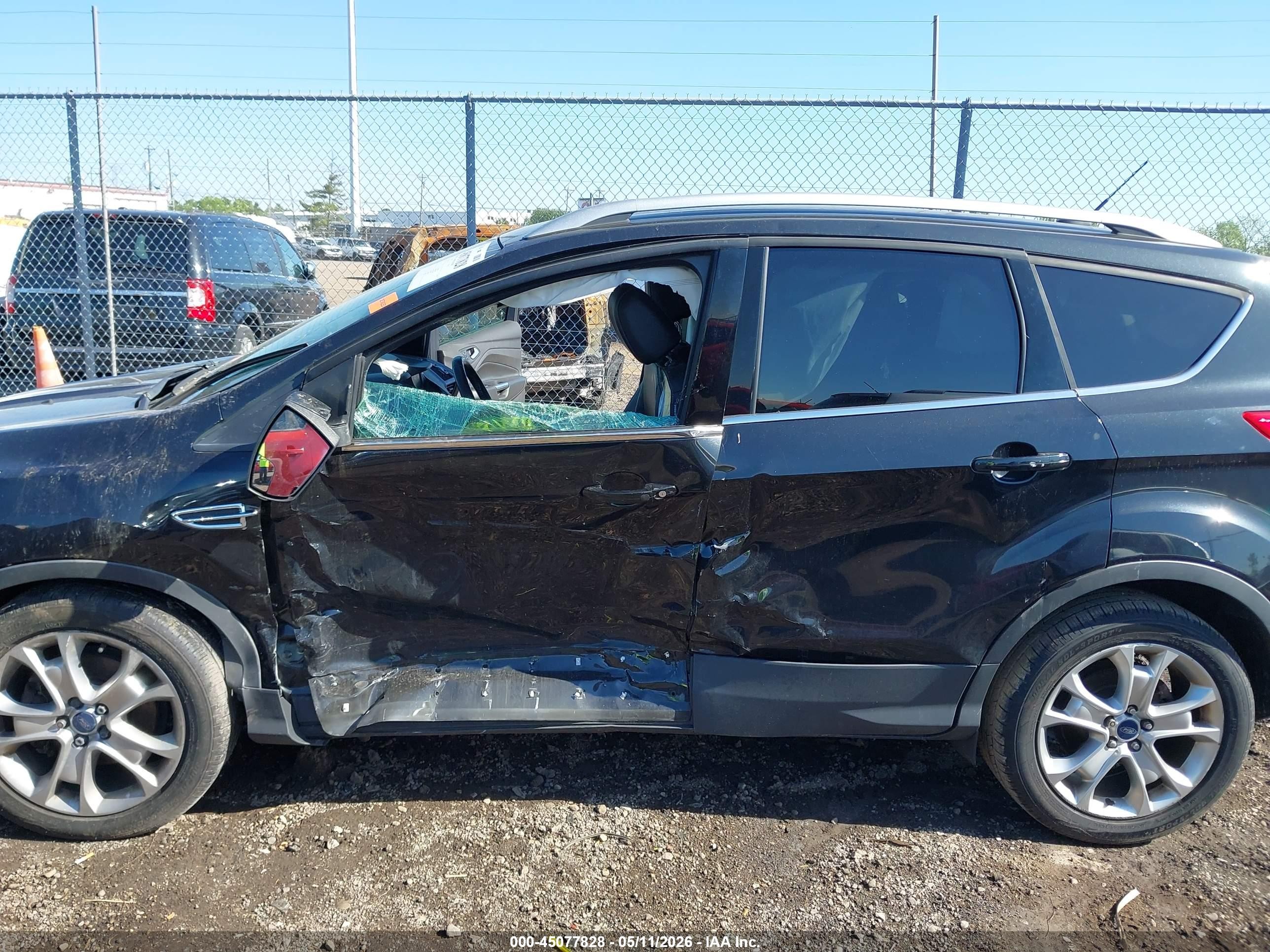 2015 Ford Escape Titanium Black vin: 1FMCU0J97FUC41629