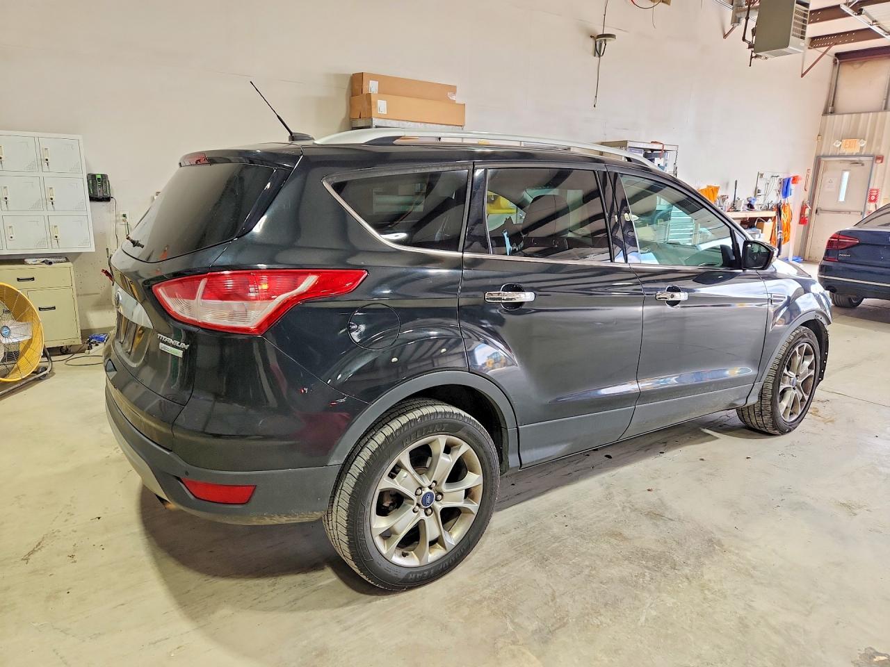 2014 Ford Escape Titanium Black vin: 1FMCU0J98EUD48560