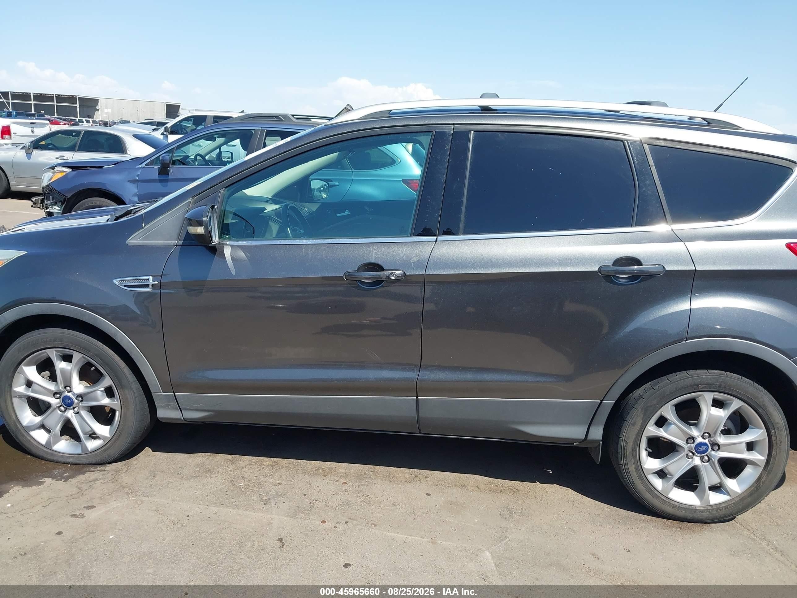 2015 Ford Escape Titanium Серебряный vin: 1FMCU0J98FUB63068