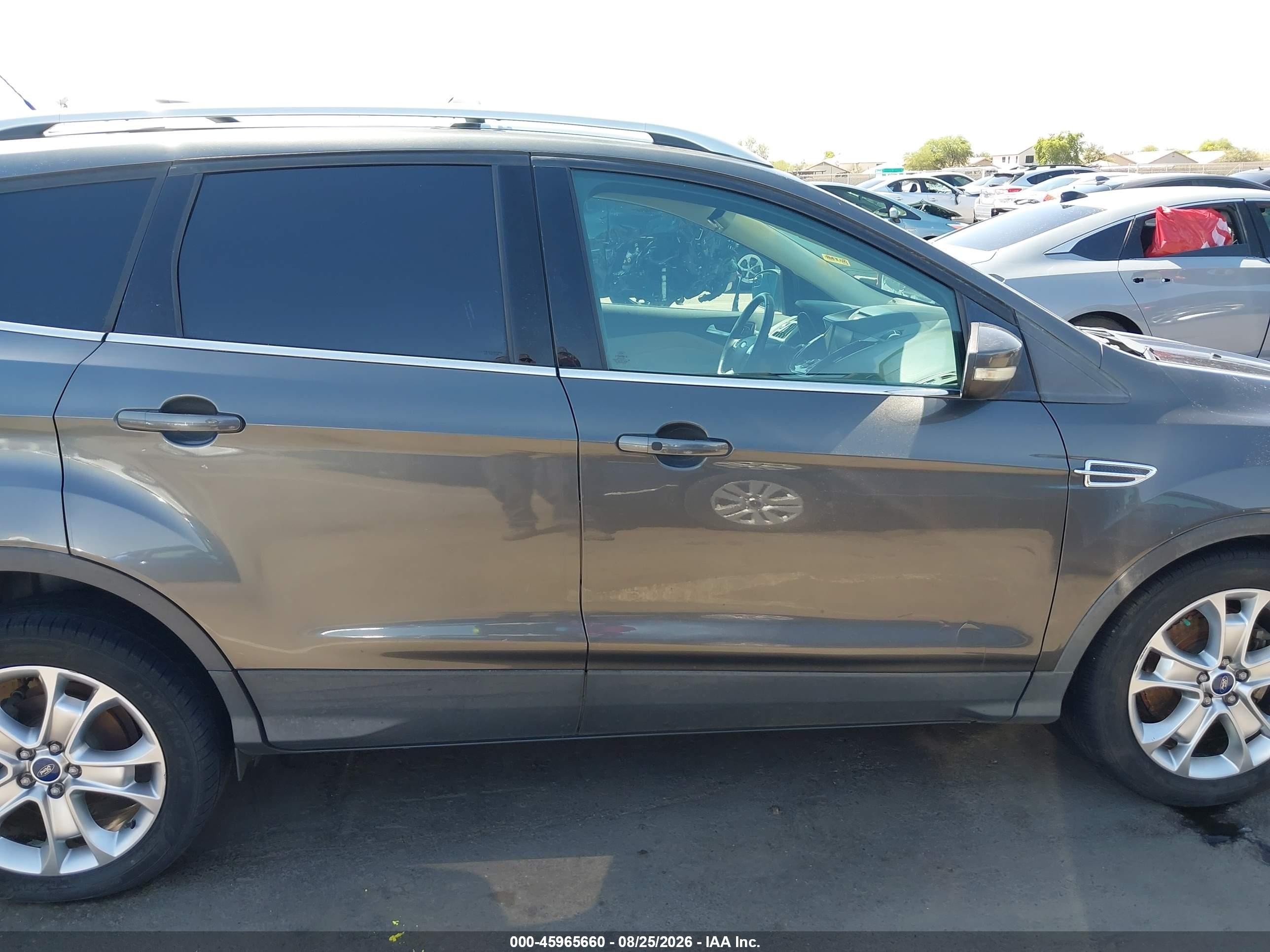 2015 Ford Escape Titanium Серебряный vin: 1FMCU0J98FUB63068
