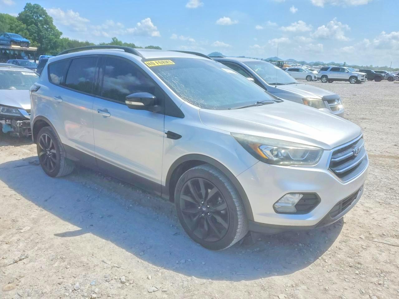 2017 Ford Escape Titanium Серебряный vin: 1FMCU0JD0HUD72389