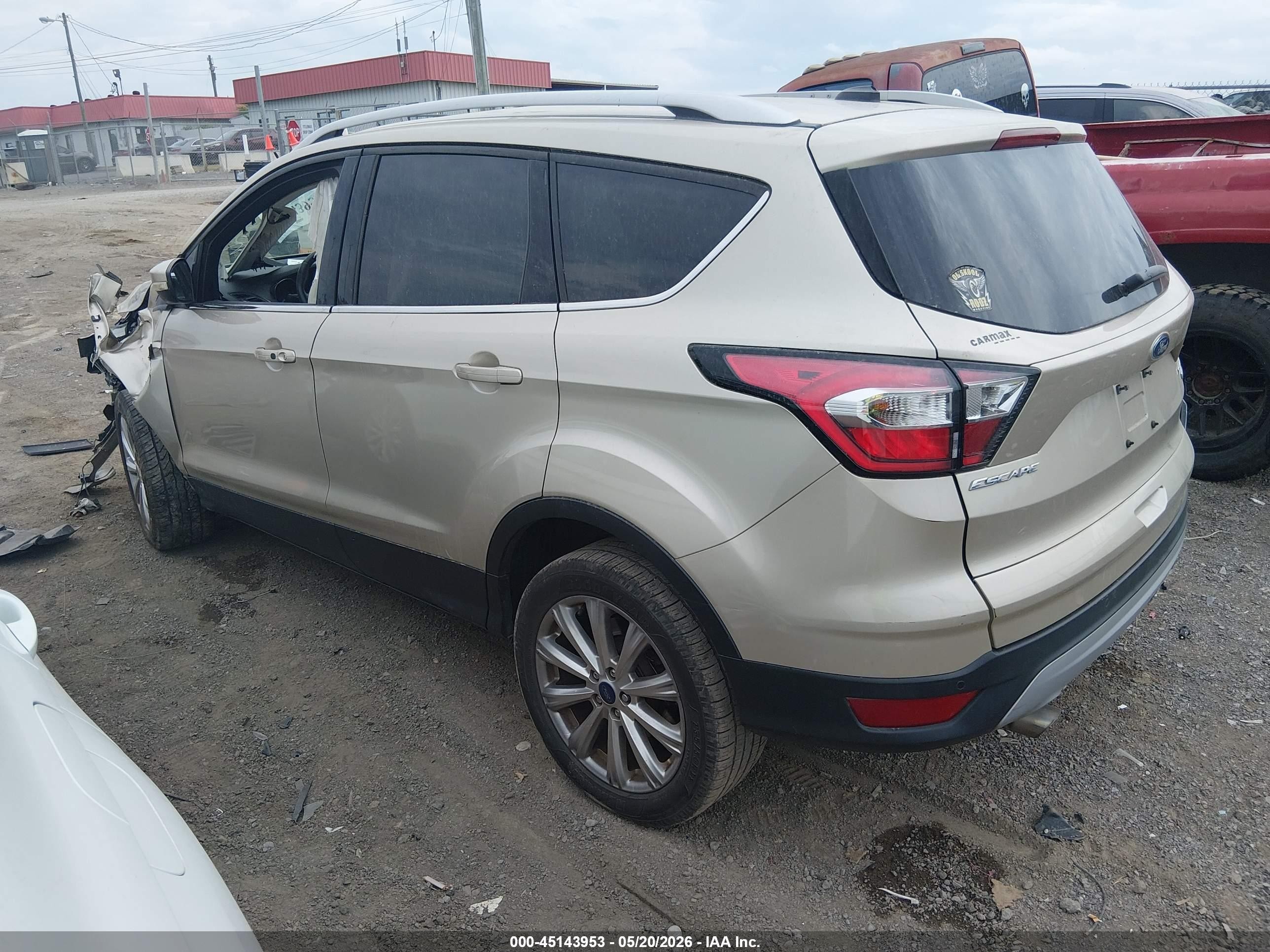 2017 Ford Escape Titanium Желто-коричневый vin: 1FMCU0JD6HUE53025