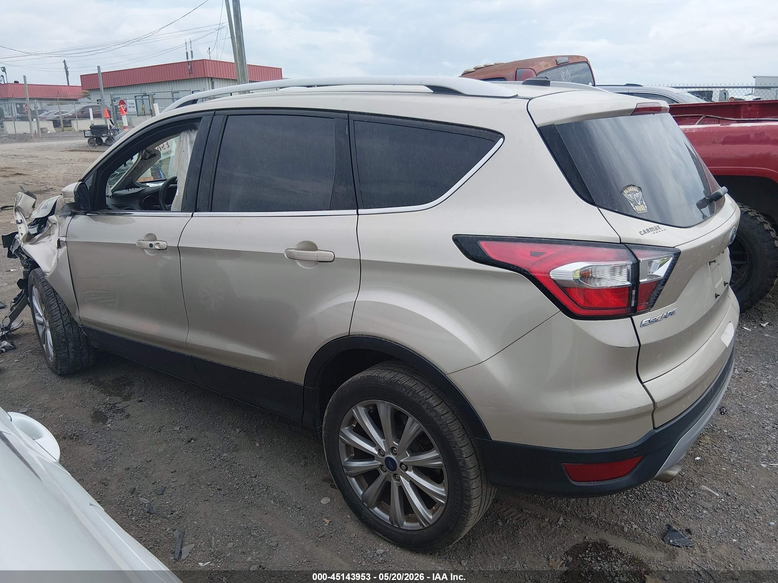 2017 Ford Escape Titanium Желто-коричневый vin: 1FMCU0JD6HUE53025