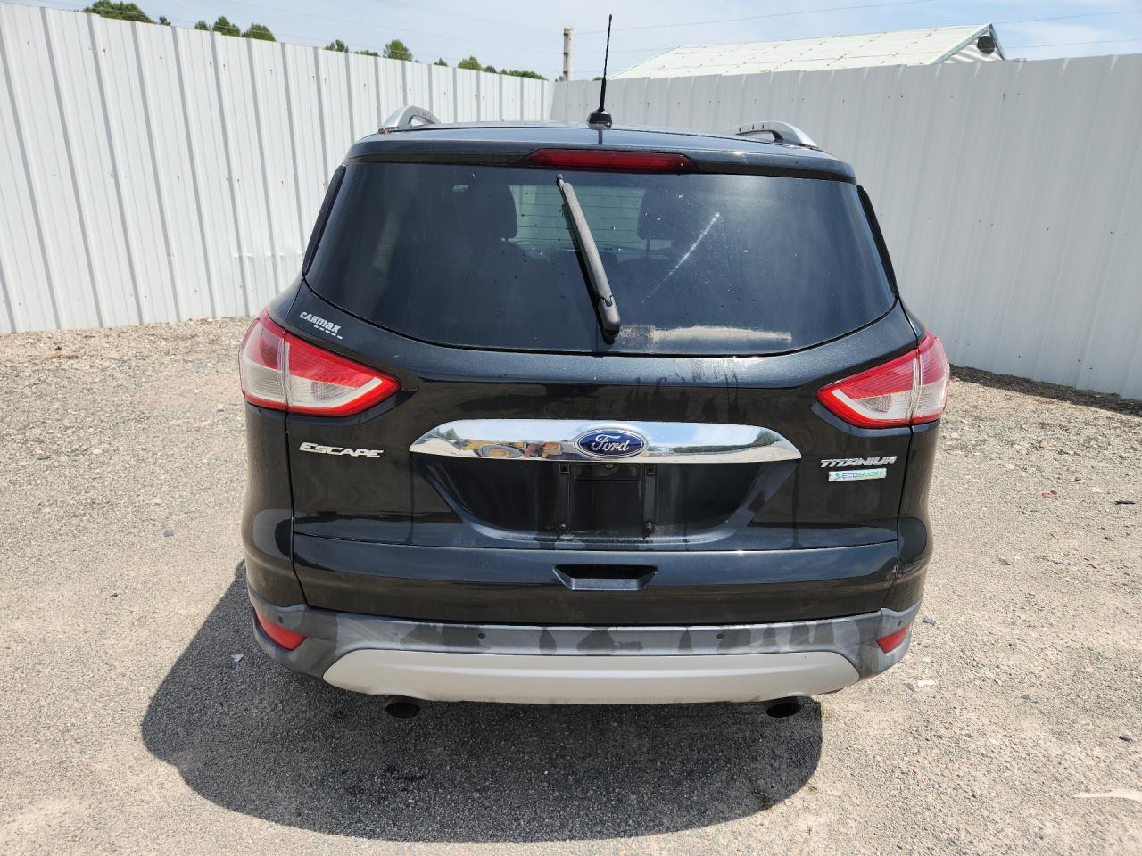 2014 Ford Escape Titanium Black vin: 1FMCU0JX2EUE21615 Damage: Lift Gate, Dent(S) W/No Paint Dmg, < 1/8 Inch