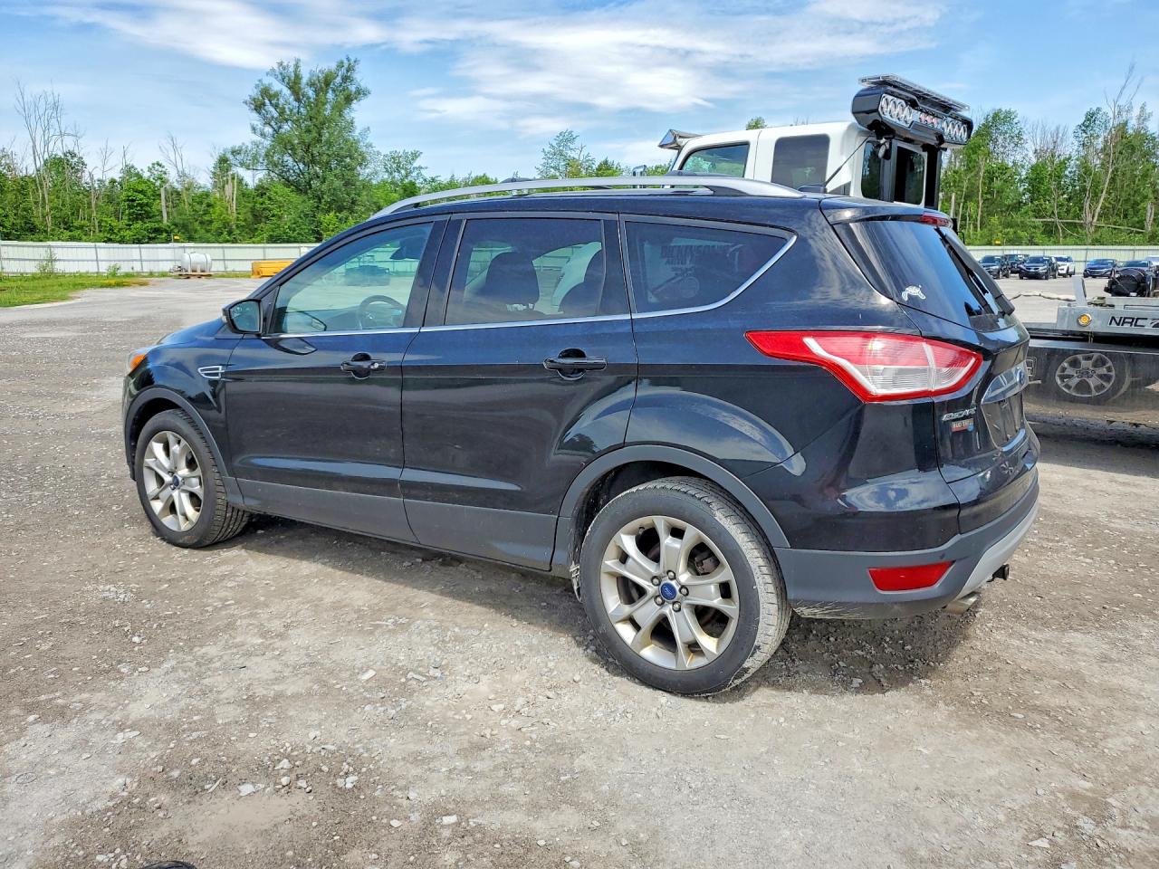 2016 Ford Escape Titanium Black vin: 1FMCU0JX2GUA35635