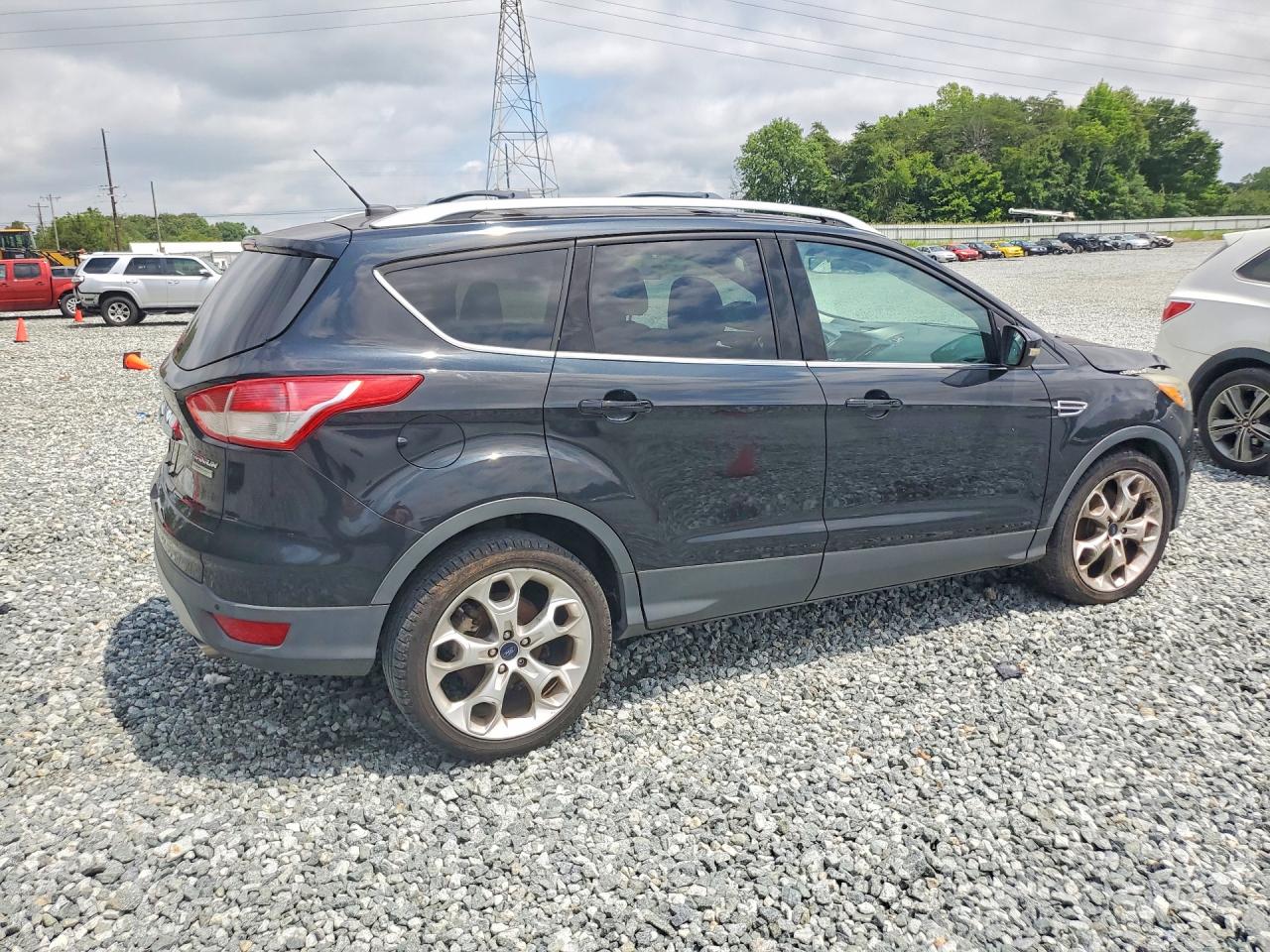 2014 Ford Escape Titanium Black vin: 1FMCU0JX7EUB54617