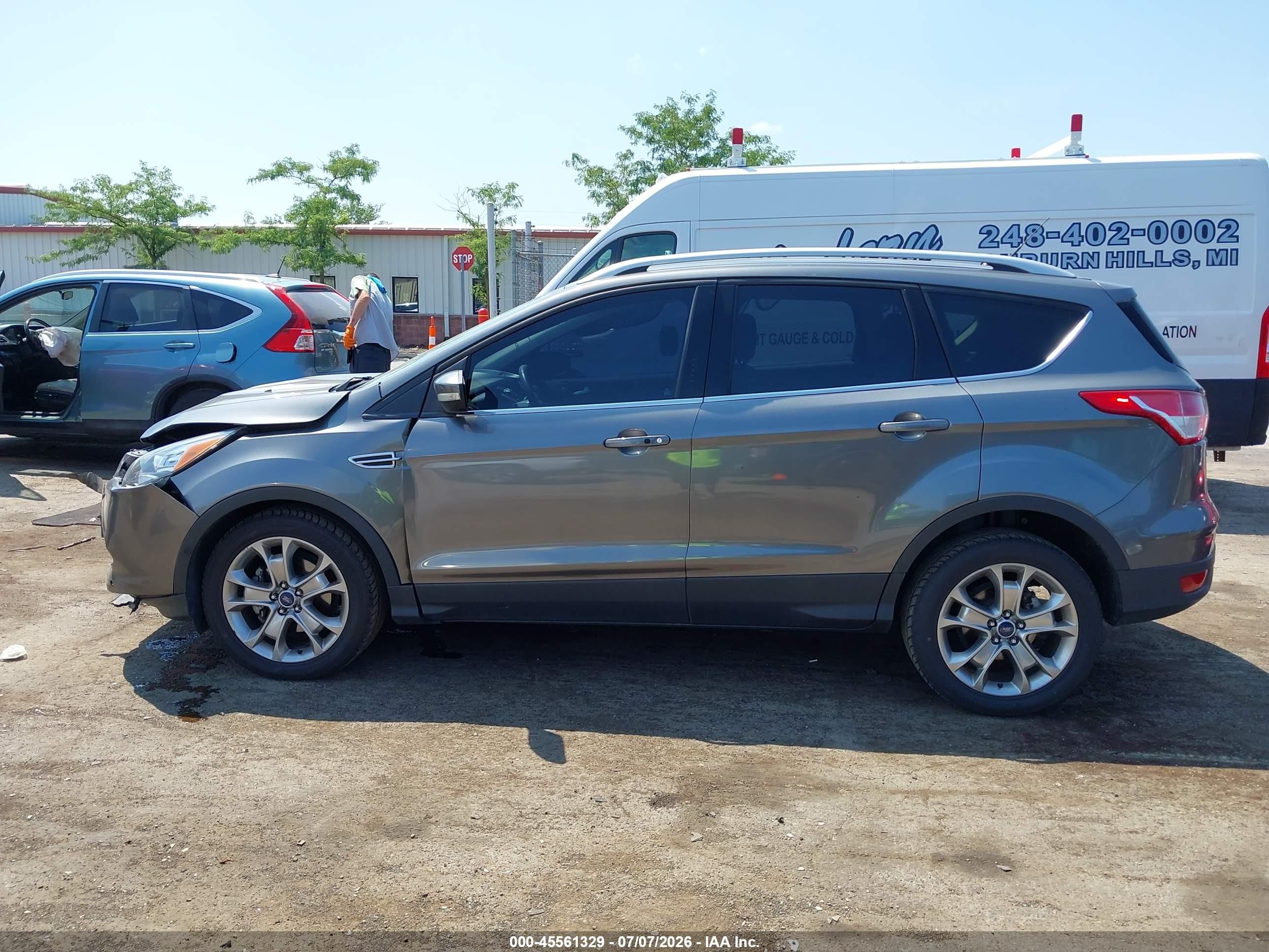 2014 Ford Escape Titanium Silver vin: 1FMCU0JX9EUE37729