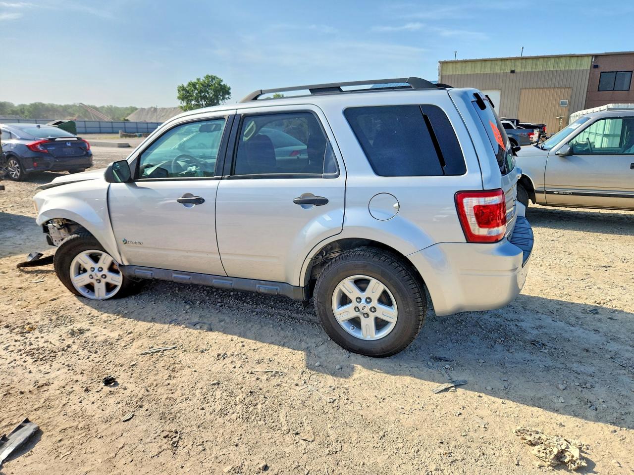 2009 Ford Escape Hybrid Серебряный vin: 1FMCU49319KA49369