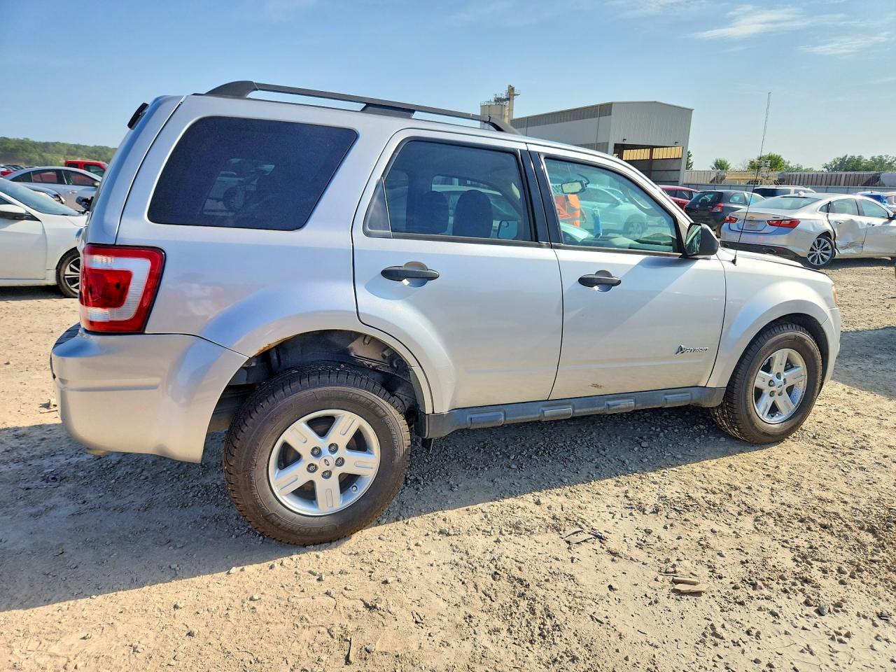 2009 Ford Escape Hybrid Серебряный vin: 1FMCU49319KA49369