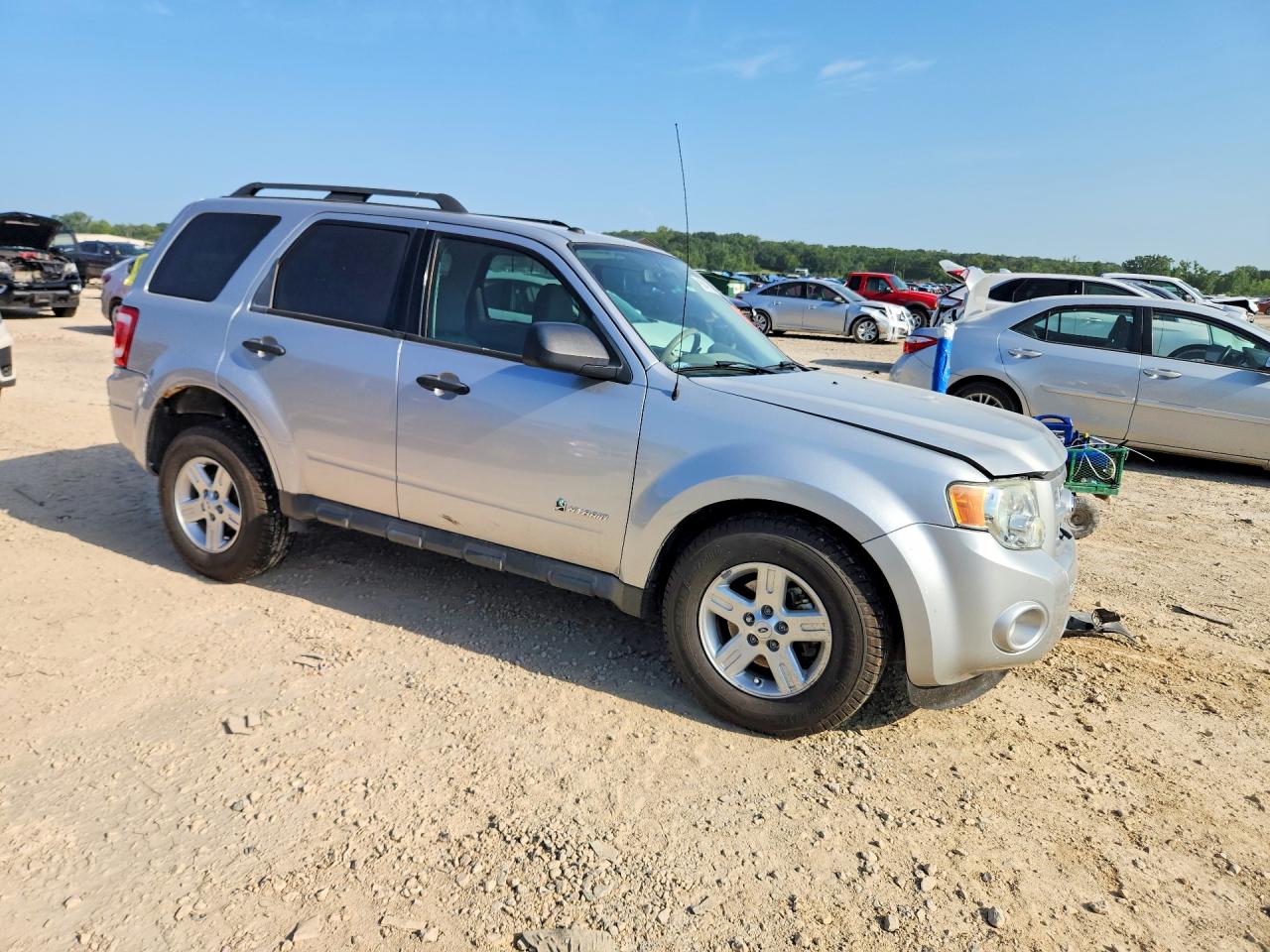 2009 Ford Escape Hybrid Серебряный vin: 1FMCU49319KA49369