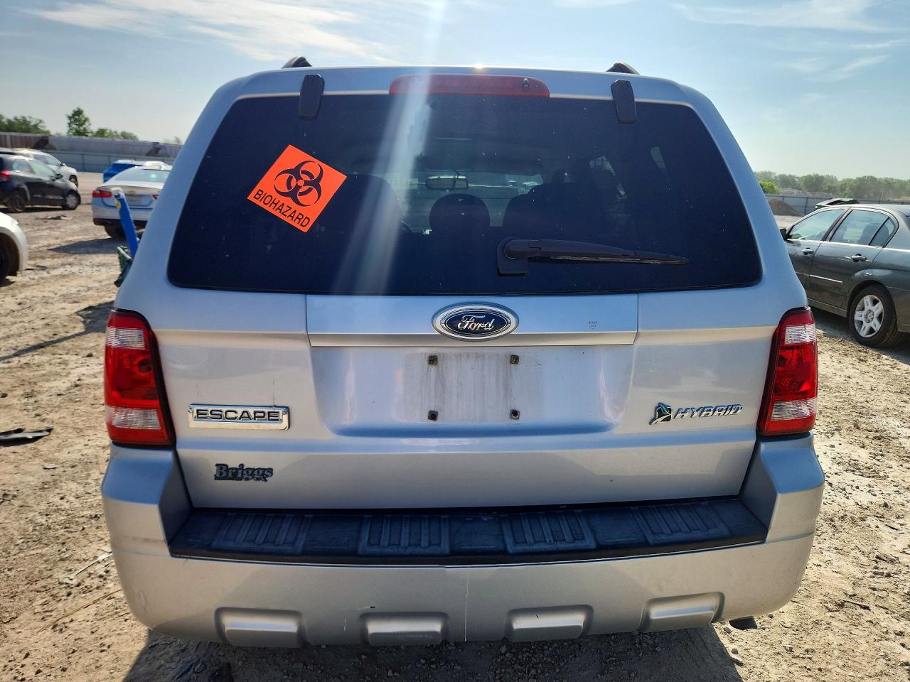 2009 Ford Escape Hybrid Серебряный vin: 1FMCU49319KA49369