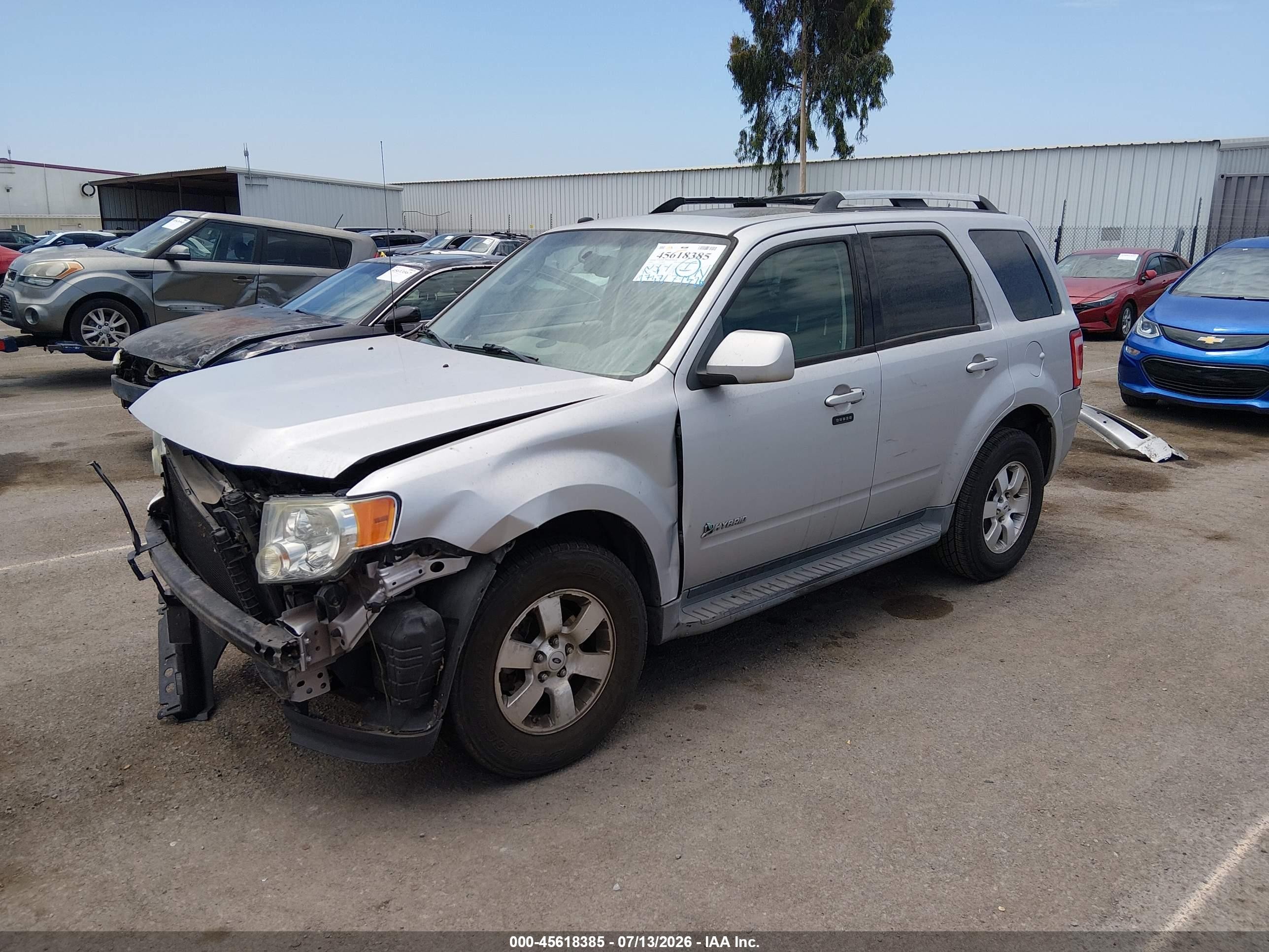 2009 Ford Escape Hybrid Limited Серебряный vin: 1FMCU49369KA07280
