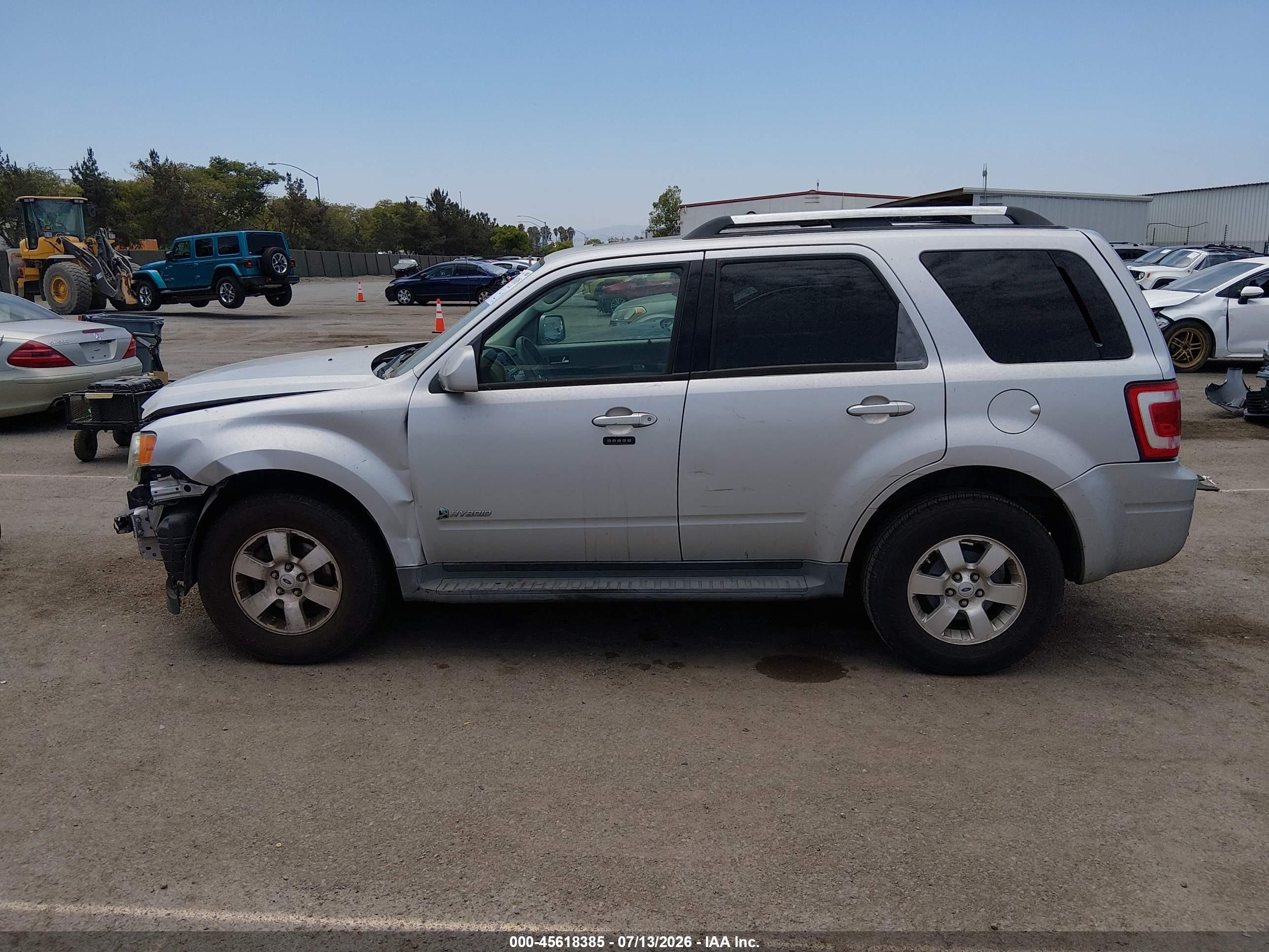 2009 Ford Escape Hybrid Limited Серебряный vin: 1FMCU49369KA07280