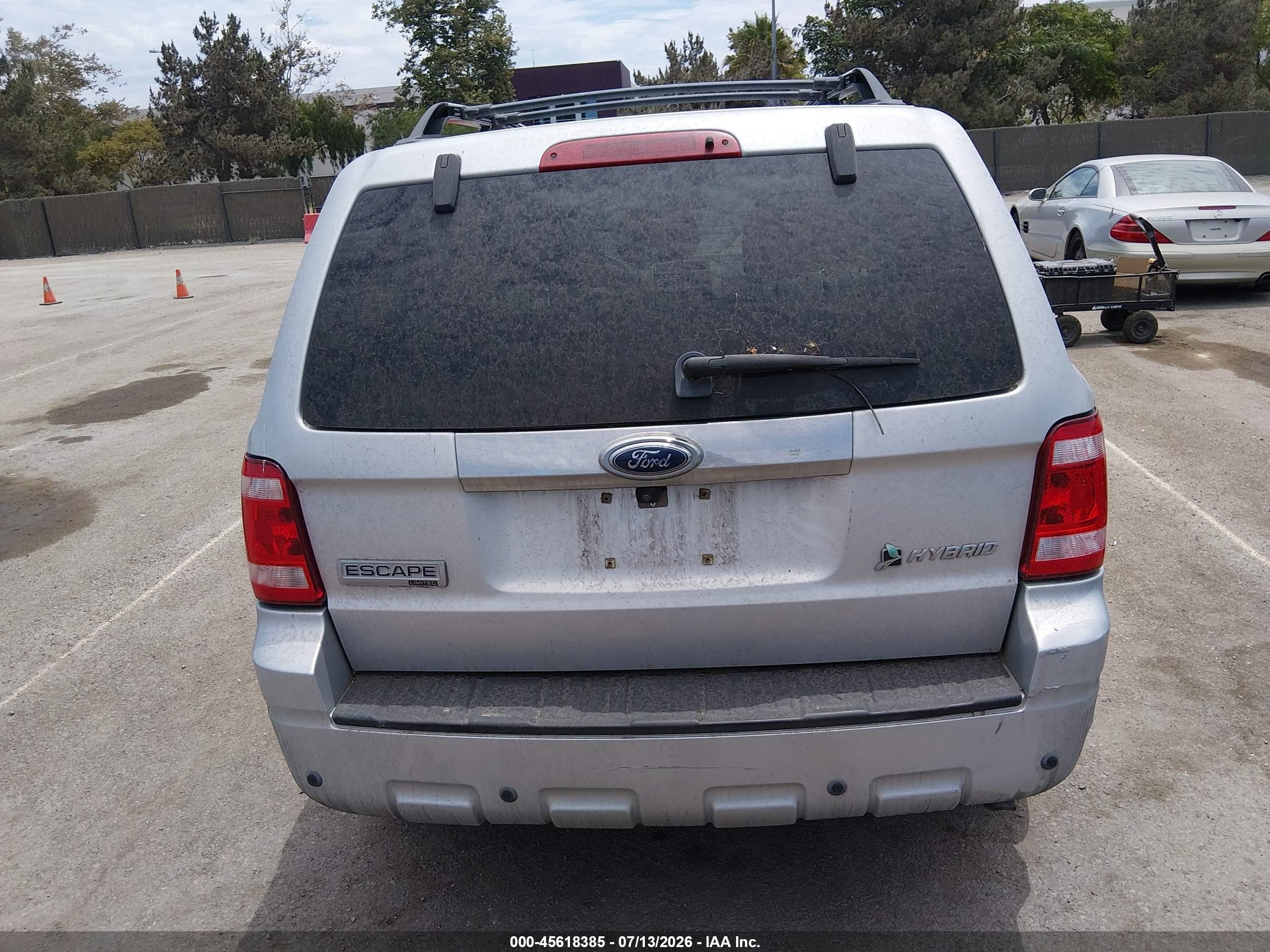 2009 Ford Escape Hybrid Limited Серебряный vin: 1FMCU49369KA07280