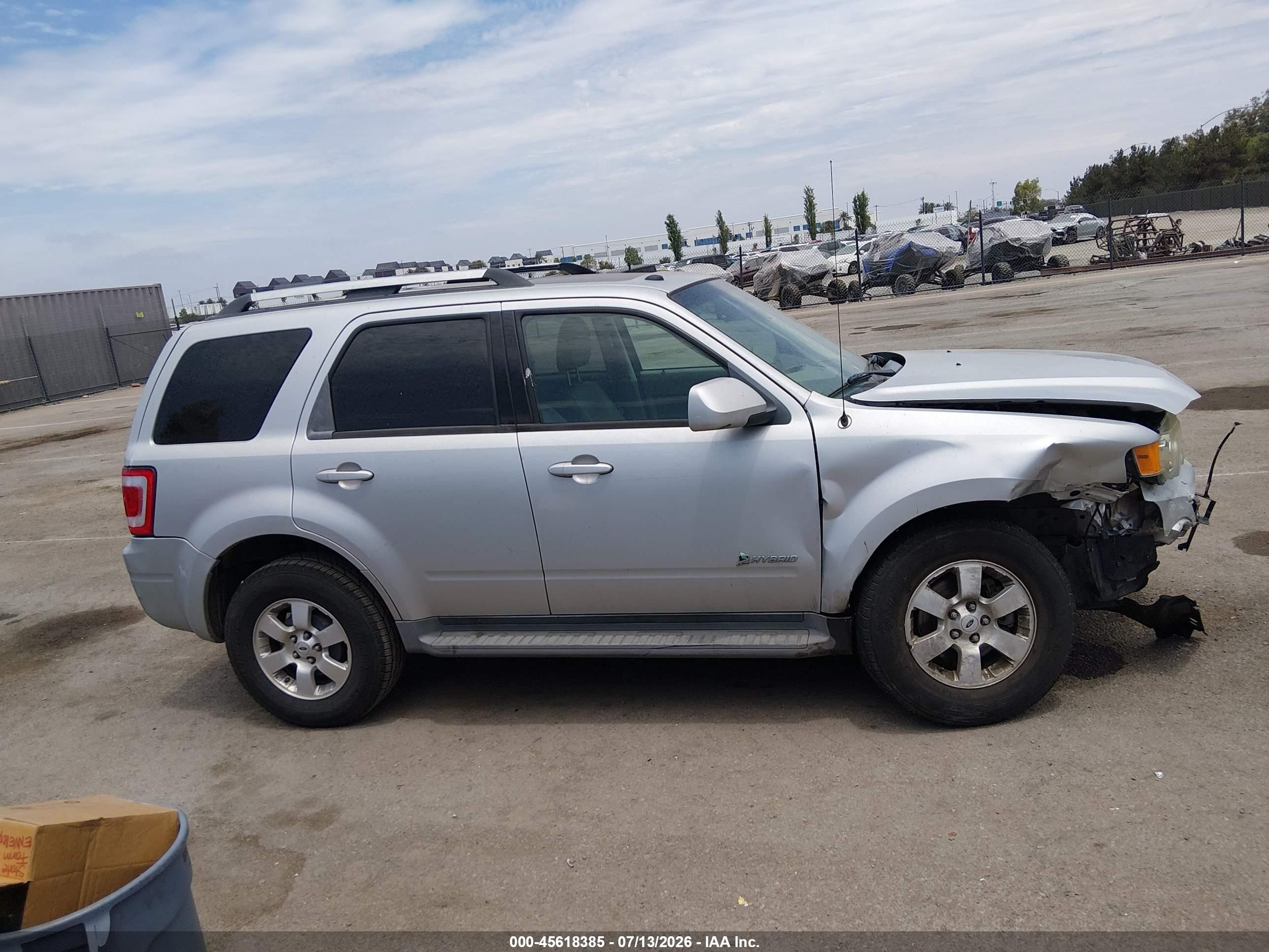 2009 Ford Escape Hybrid Limited Серебряный vin: 1FMCU49369KA07280